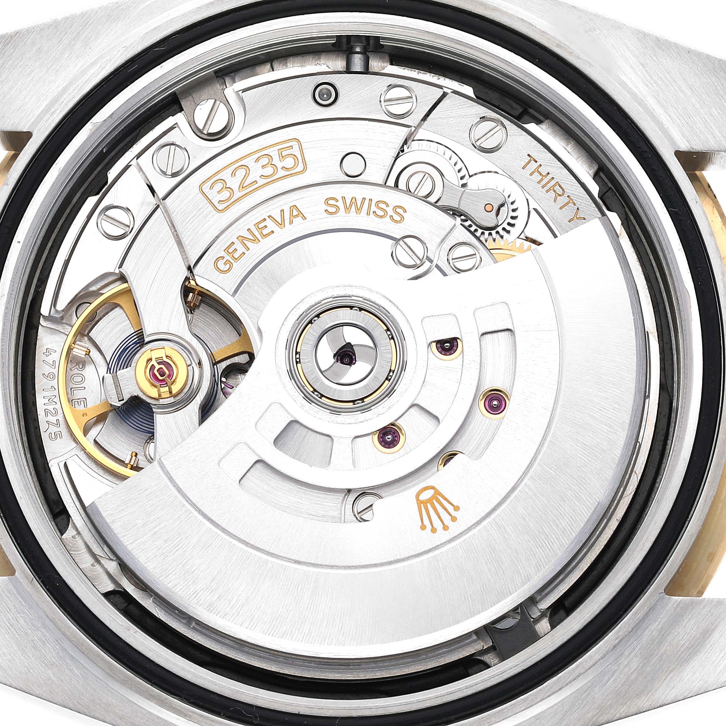 The image shows the intricate movement mechanism of a Rolex Datejust 41 126303 Men's Steel and Gold (two tone) Black Dial 126303 Men's Steel and Gold (two tone) Black Dial watch viewed from the back.