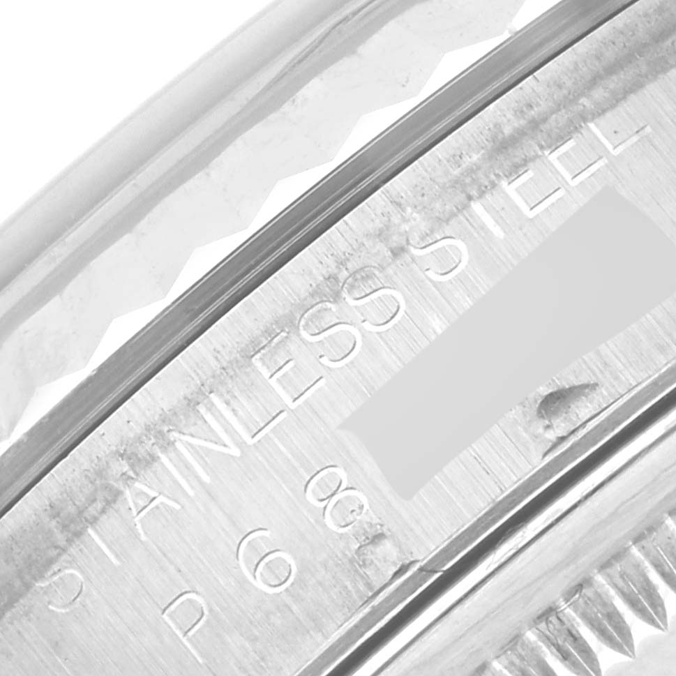 The image shows a close-up angle of the case back engravings of a Rolex Datejust 16234 Men's Stainless Steel Blue Dial 16234 Men's Stainless Steel Blue Dial watch, highlighting "Stainless Steel."