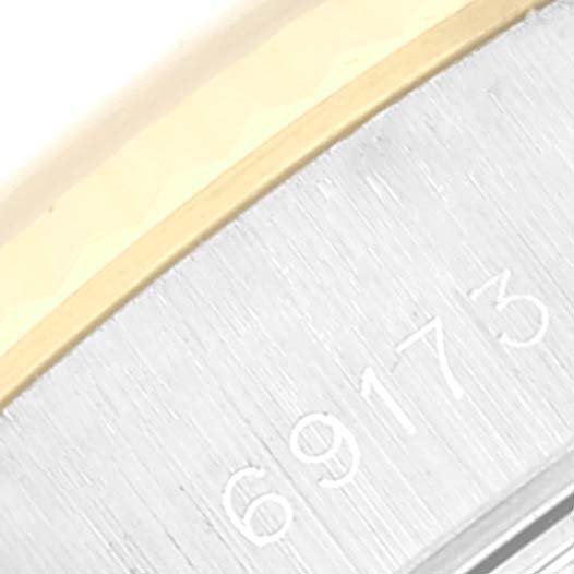 This image shows a close-up of the side case and bracelet of the Rolex Datejust 69173 Women's Steel and Gold (two tone) Blue Dial 69173 Women's Steel and Gold (two tone) Blue Dial watch, specifically highlighting the model number 69173.