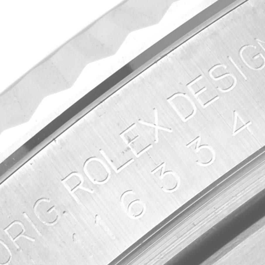 This is a close-up shot of the case engraving on the Rolex Datejust 41 116334 Men
s Stainless Steel Silver Dial 116334 Men
s Stainless Steel Silver Dial model watch.