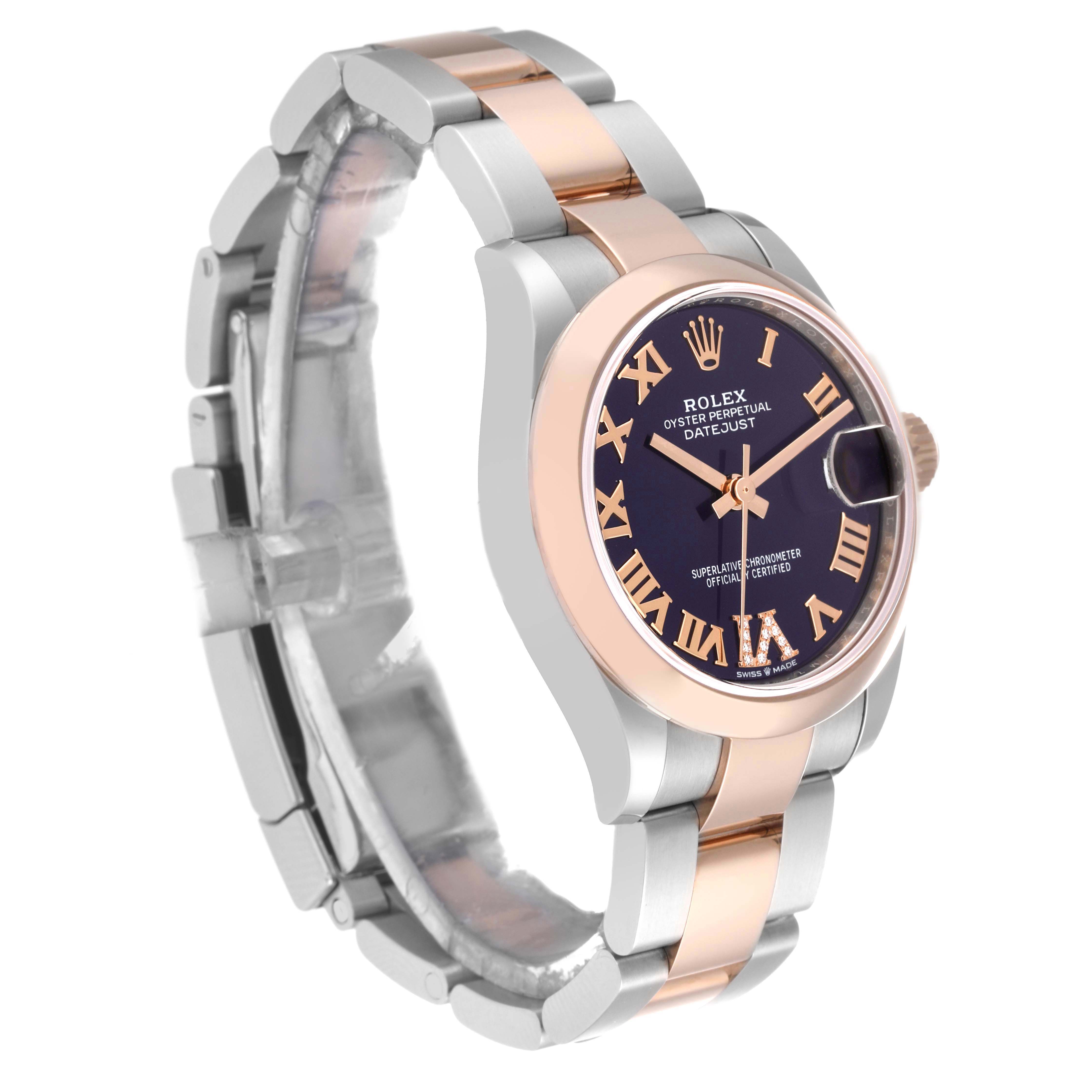 This Rolex Mid-Size 278241 Women's Steel and Gold (two tone) Purple Dial 278241 Women's Steel and Gold (two tone) Purple Dial Oyster Perpetual Datejust watch is shown at a side angle, highlighting the two-tone bracelet, dial, and bezel.