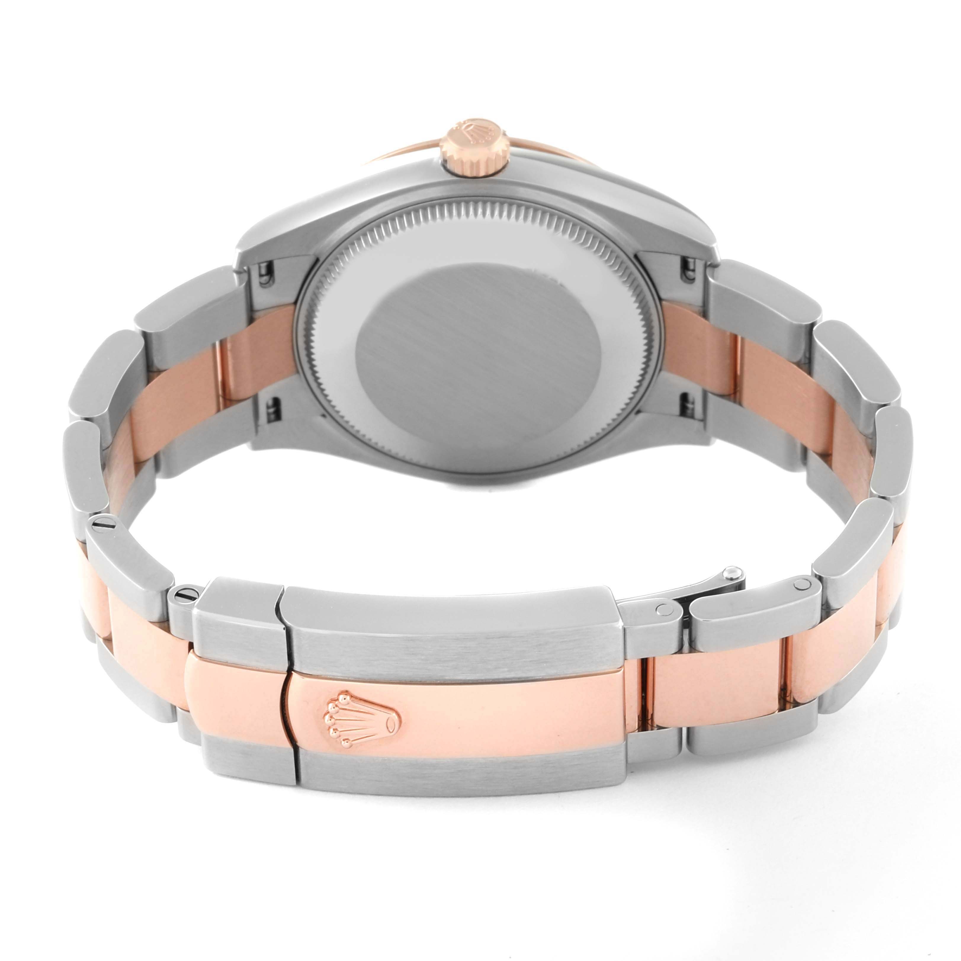 This image shows the back view and clasp of a Rolex Mid-Size 278241 Women's Steel and Gold (two tone) Purple Dial 278241 Women's Steel and Gold (two tone) Purple Dial model with a two-tone strap.