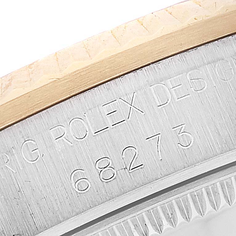 The image shows a close-up of the case back edge of a Mid-Size Rolex watch, displaying the model number 68273.