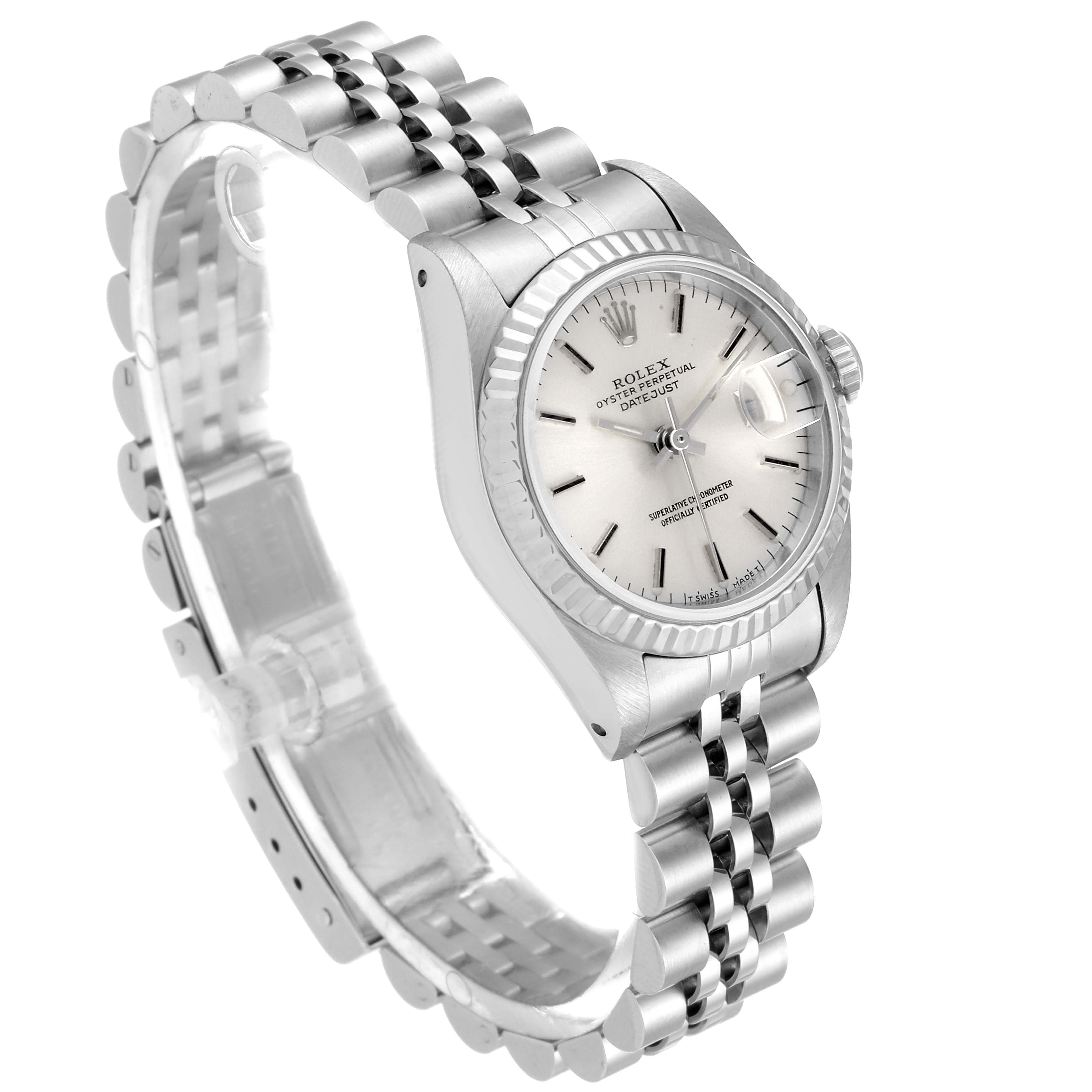 The Rolex Datejust 69174 Women's Stainless Steel Silver Dial 69174 Women's Stainless Steel Silver Dial watch is shown at a slight angle, highlighting the face, bezel, and partial bracelet.