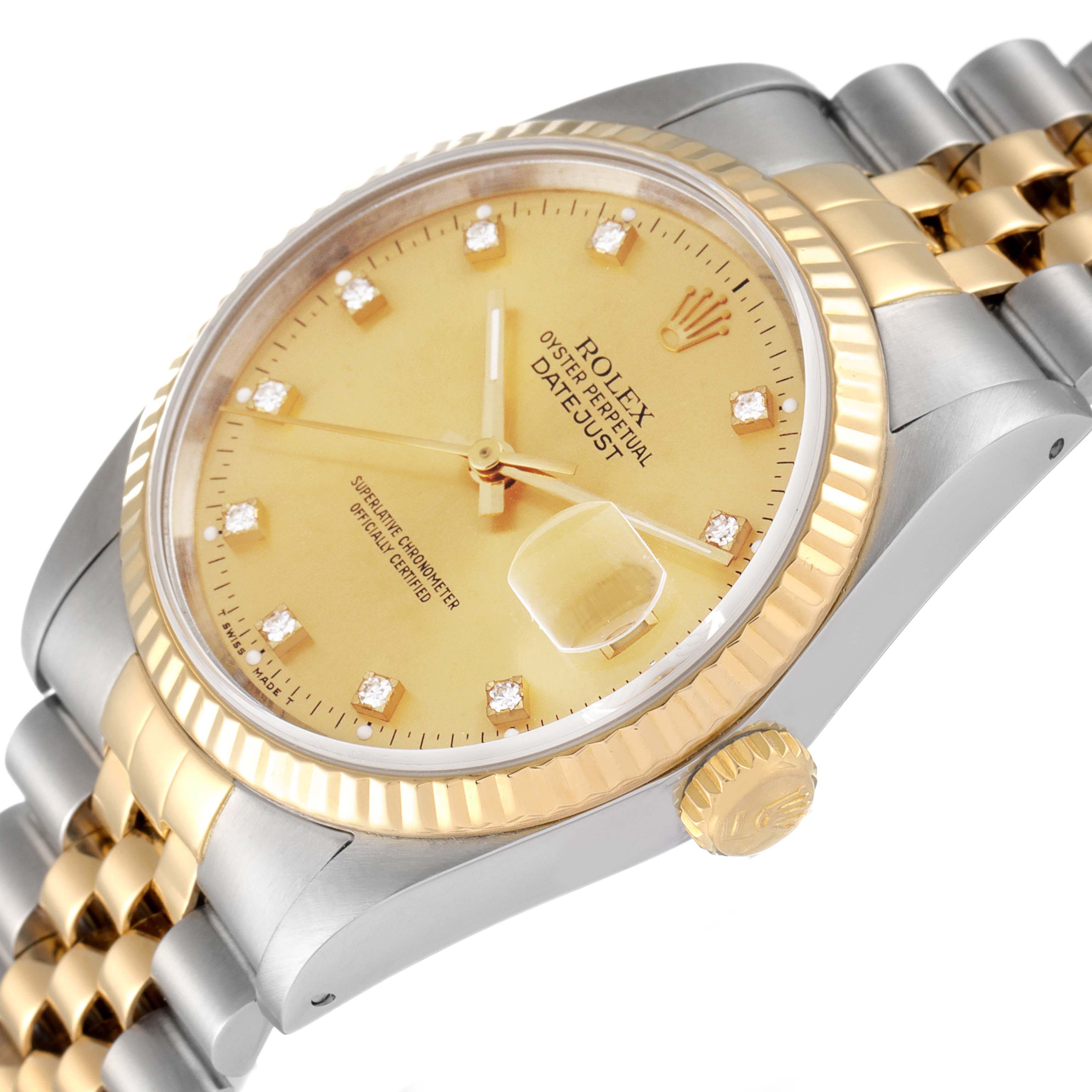 This image shows a close-up angled view of a Rolex Datejust 16233 Men
s Steel and Gold (two tone) Champagne Dial 16233 Men
s Steel and Gold (two tone) Champagne Dial, displaying the dial, crown, case, and part of the bracelet.