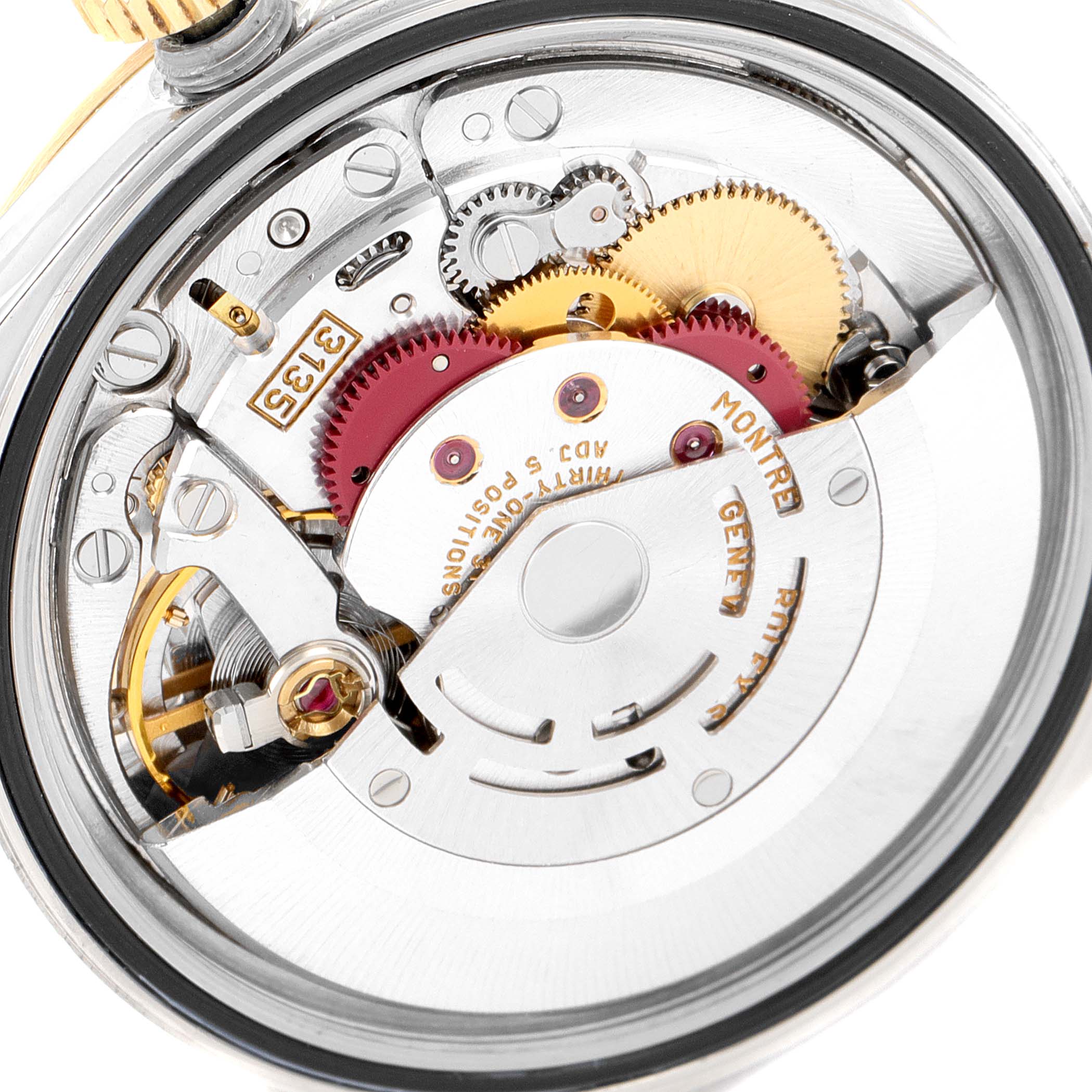 This image shows the internal mechanics of a Rolex Datejust 16233 Men's Steel and Gold (two tone) Champagne Dial 16233 Men's Steel and Gold (two tone) Champagne Dial watch, highlighting the gears, movement, and intricate components from a close-up angle.
