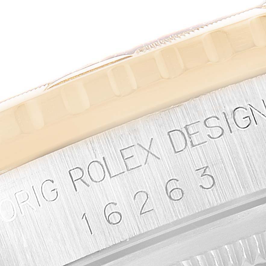 This image shows a close-up of the bezel and engraved case of the Rolex Turn-o-Graph 16263 Men's Steel and Gold (two tone) Champagne Dial 16263 Men's Steel and Gold (two tone) Champagne Dial model.