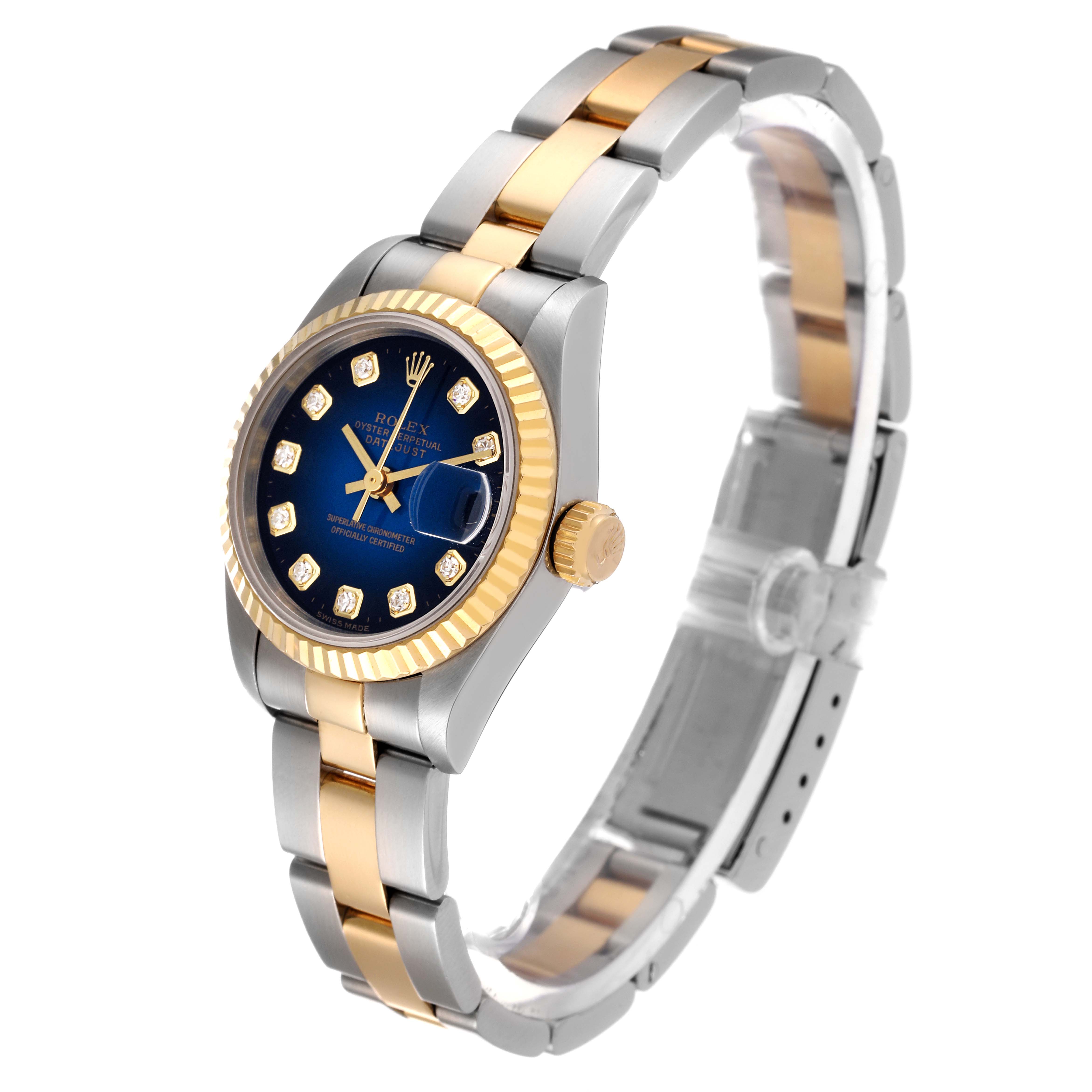 The image shows a Rolex Datejust 69173 Women's Steel and Gold (two tone) Blue Dial 69173 Women's Steel and Gold (two tone) Blue Dial watch at a three-quarter angle, highlighting its gold and stainless steel bracelet and blue dial.