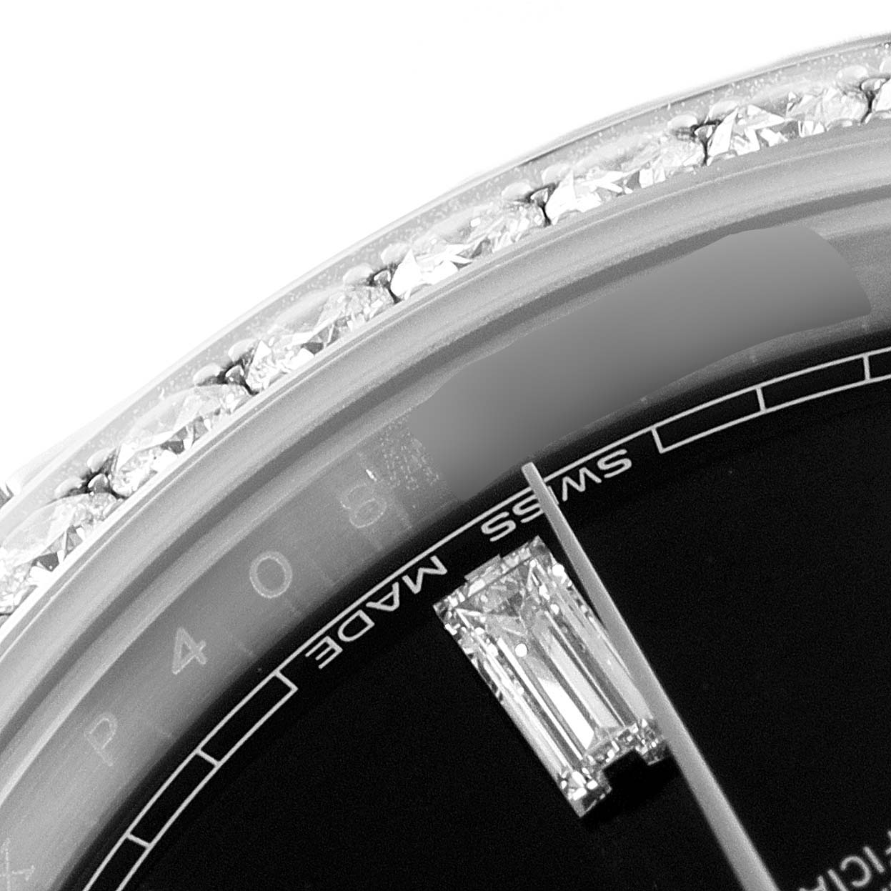 This image shows a close-up of the dial and bejeweled bezel of the Rolex President 228349RBR Men's White Gold Black Dial 228349RBR Men's White Gold Black Dial model watch.