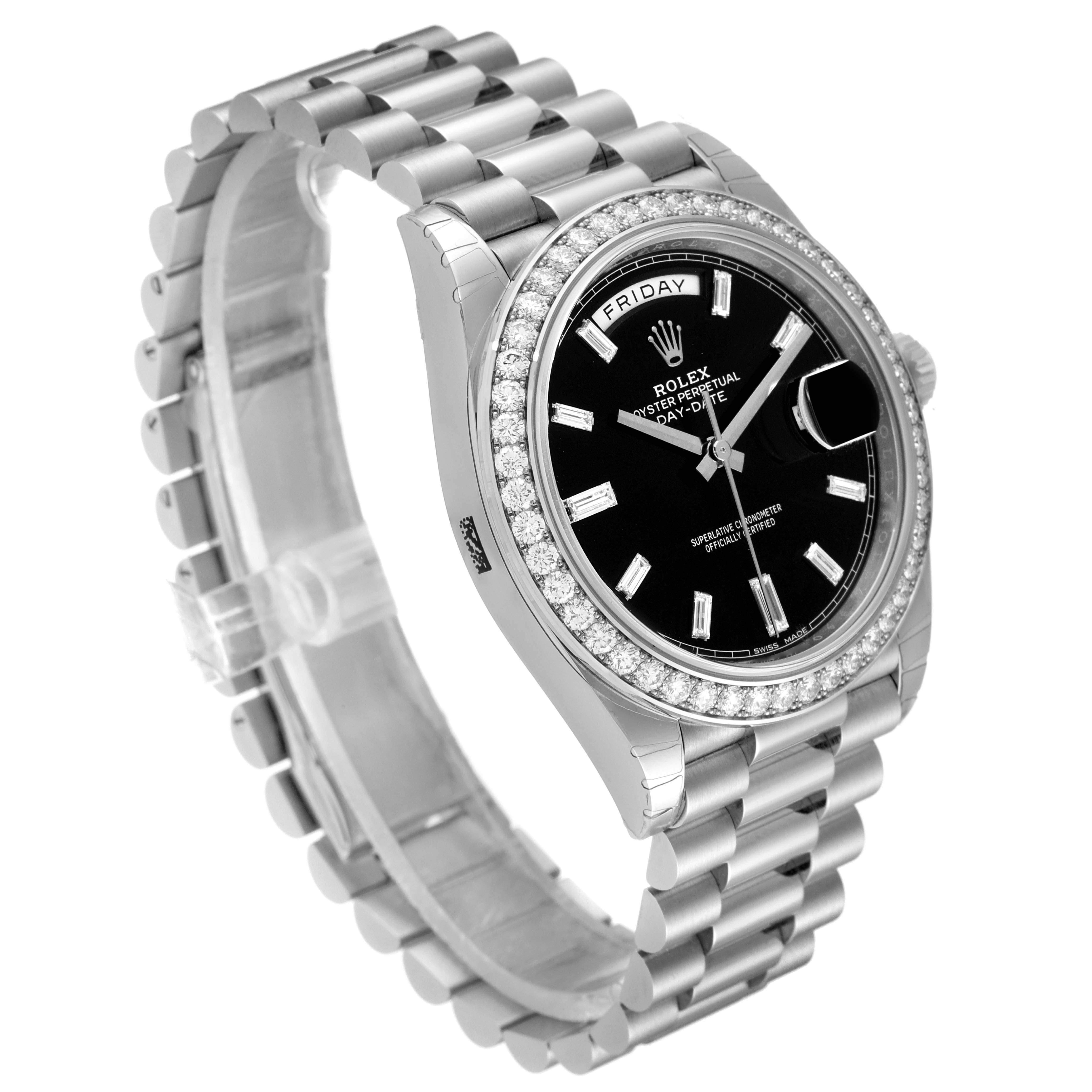 The Rolex President 228349RBR Men's White Gold Black Dial 228349RBR Men's White Gold Black Dial model watch is shown at a three-quarter angle, highlighting its black dial, diamond bezel, and silver bracelet.