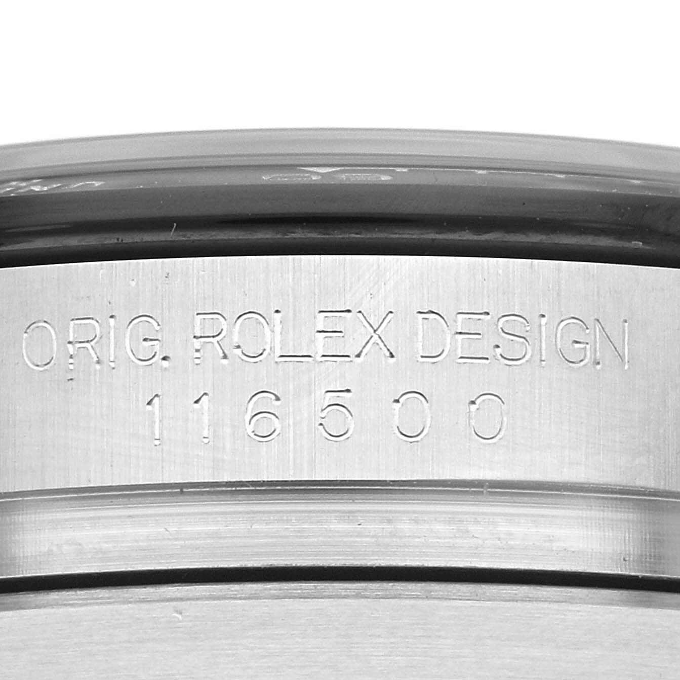 The image shows a close-up of the Rolex Daytona 116500LN Men's Stainless Steel White Dial 116500LN Men's Stainless Steel White Dial's bezel, displaying "ORIG ROLEX DESIGN 116500" engraving.