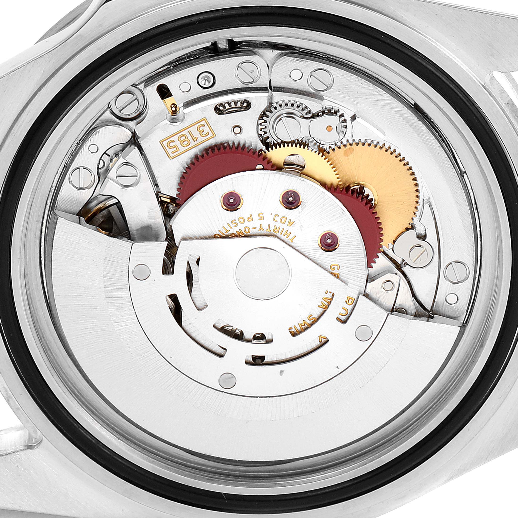 The image shows the internal mechanism of a Rolex Explorer 16570 Men's Stainless Steel Black Dial 16570 Men's Stainless Steel Black Dial watch, viewed from the back case with gears and components visible.