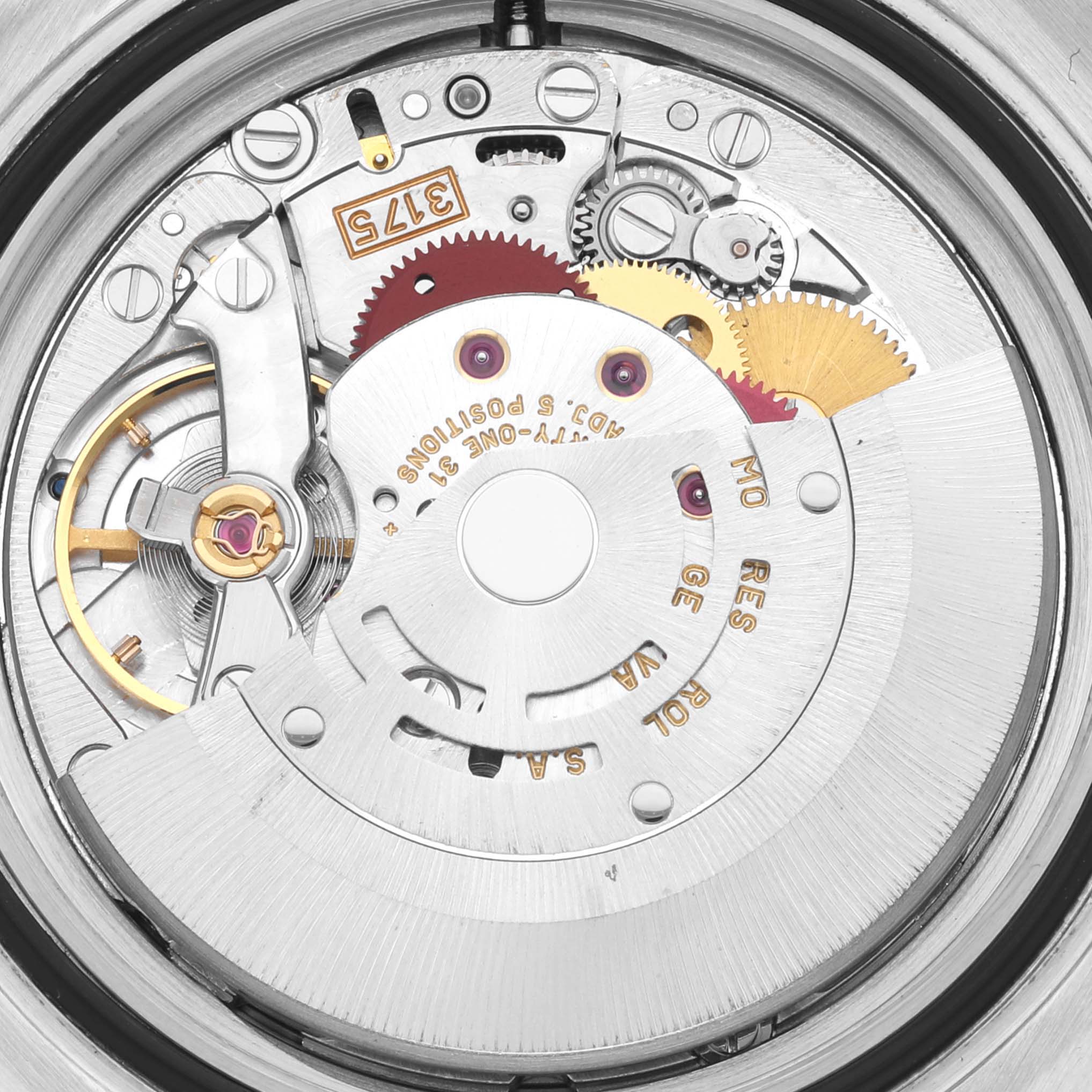 The image shows the inner workings of a Rolex GMT-Master 16700 Men
s Stainless Steel Black Dial 16700 Men
s Stainless Steel Black Dial watch, highlighting its movement and intricate gears from a close-up angle.
