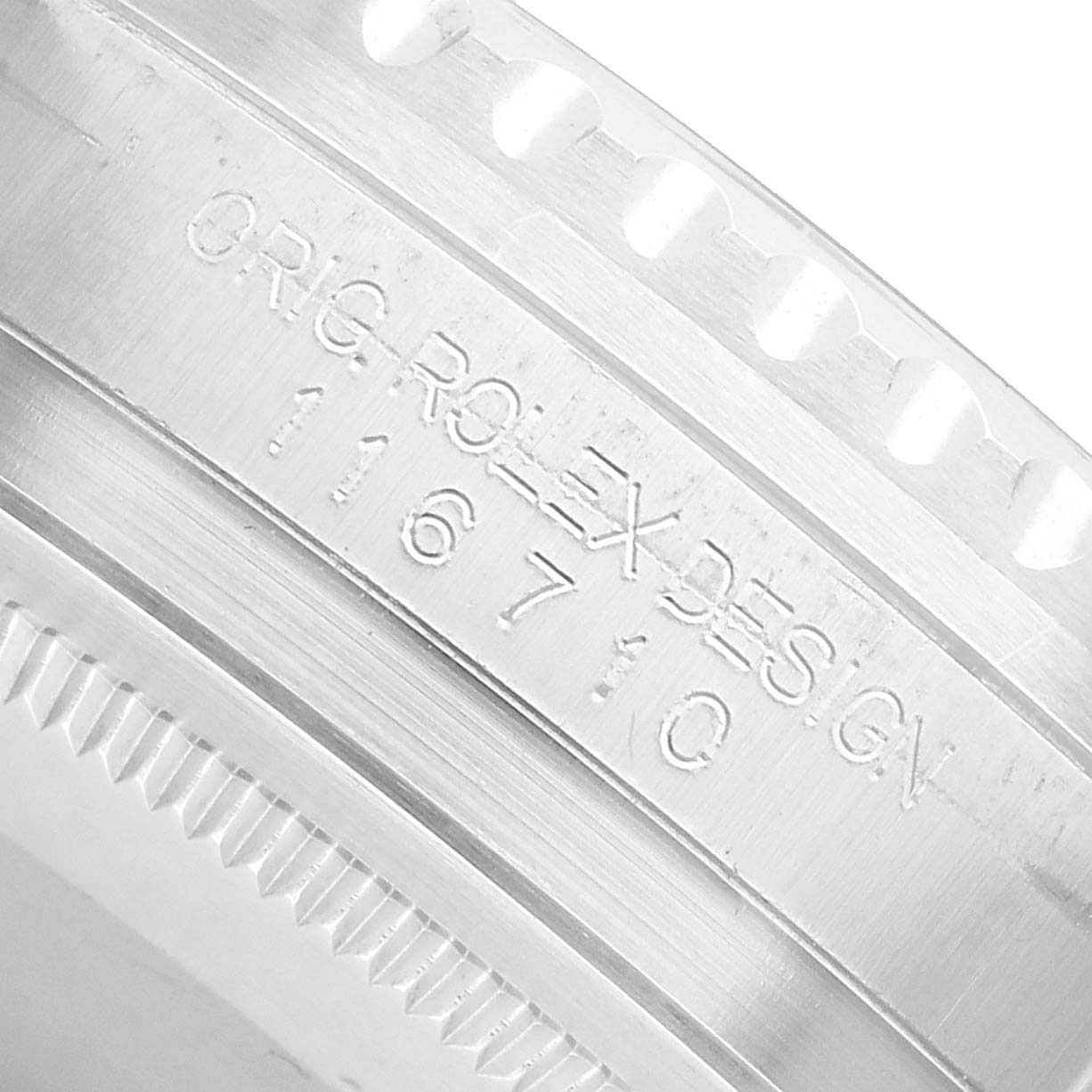 The image shows a close-up of the case side of a Rolex GMT-Master 126710BLNR Men's Stainless Steel Black Dial, displaying the engraved model number "116710".