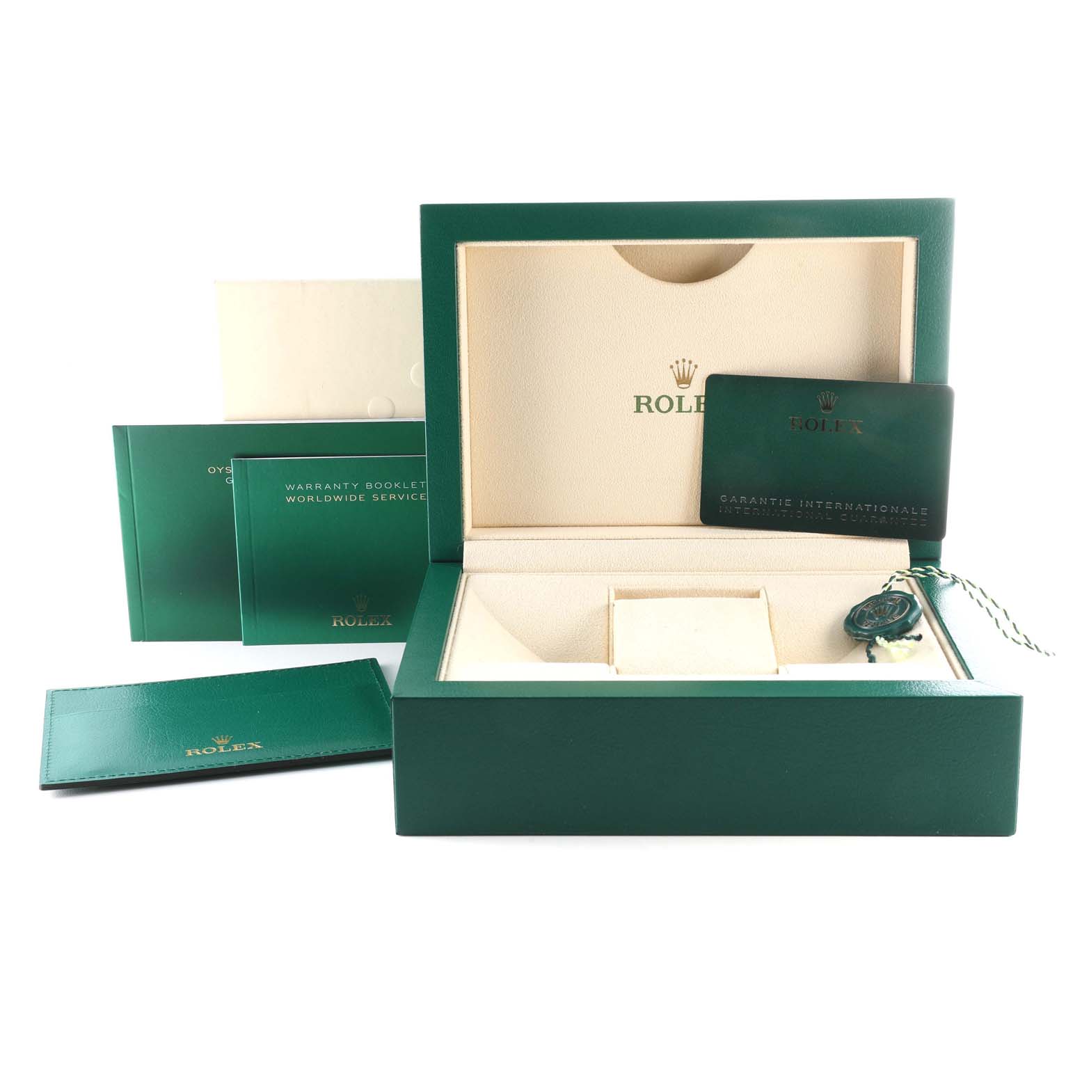 This image shows the packaging and accessories for the Rolex GMT-Master 126710 Men's Stainless Steel Black Dial 126710 Men's Stainless Steel Black Dial, including the box, warranty card, booklets, and tags.