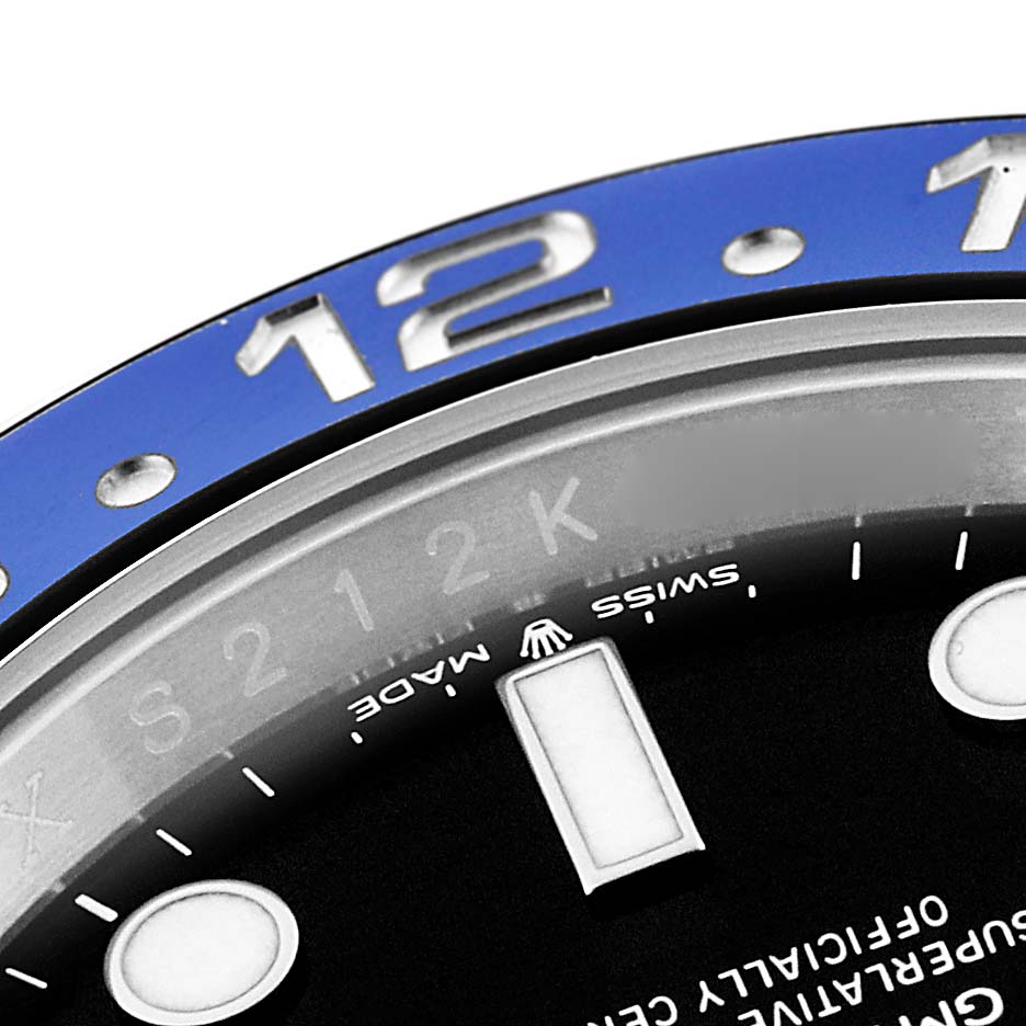 This close-up image shows the bezel and part of the dial with the "Swiss Made" text on a Rolex GMT-Master 126710 Men's Stainless Steel Black Dial 126710 Men's Stainless Steel Black Dial watch.