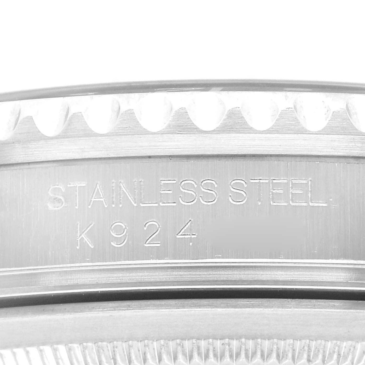 This close-up image displays the engravings on the stainless steel case of a Rolex GMT-Master 16710 Men
s Stainless Steel Black Dial 16710 Men
s Stainless Steel Black Dial watch.