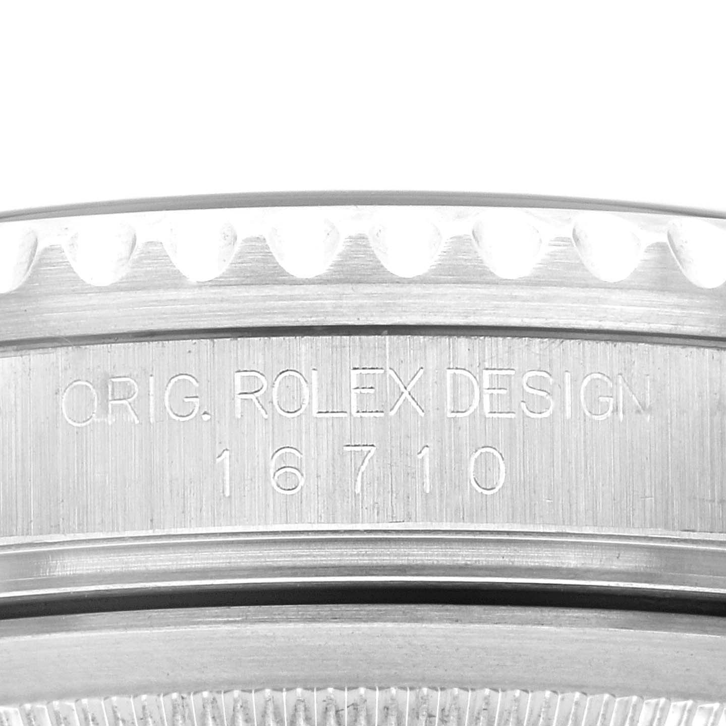 Close-up view of the bezel and case side of the Rolex GMT-Master 16710 Men
s Stainless Steel Black Dial 16710 Men
s Stainless Steel Black Dial model, showing engraved text and reference number 16710.