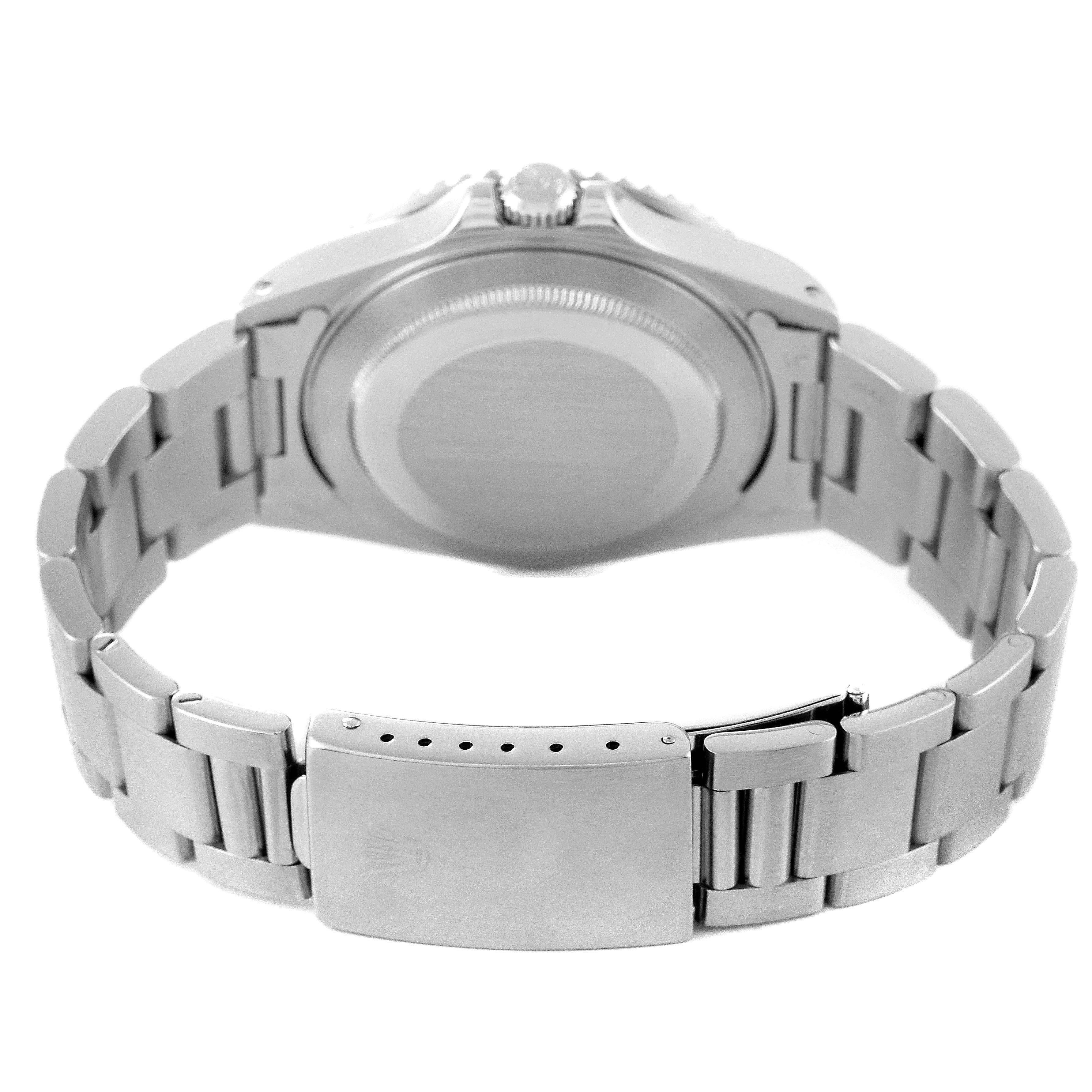 This image shows the back view of a Rolex GMT-Master 16710 Men
s Stainless Steel Black Dial 16710 Men
s Stainless Steel Black Dial watch, highlighting the case back and the clasp of the bracelet.