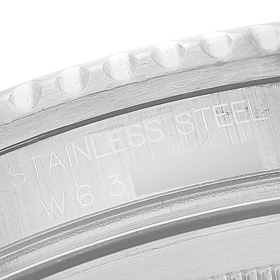 The image shows a close-up of the stainless steel case and engraved details on a Rolex GMT-Master 16710 Men
s Stainless Steel Black Dial 16710 Men
s Stainless Steel Black Dial watch.