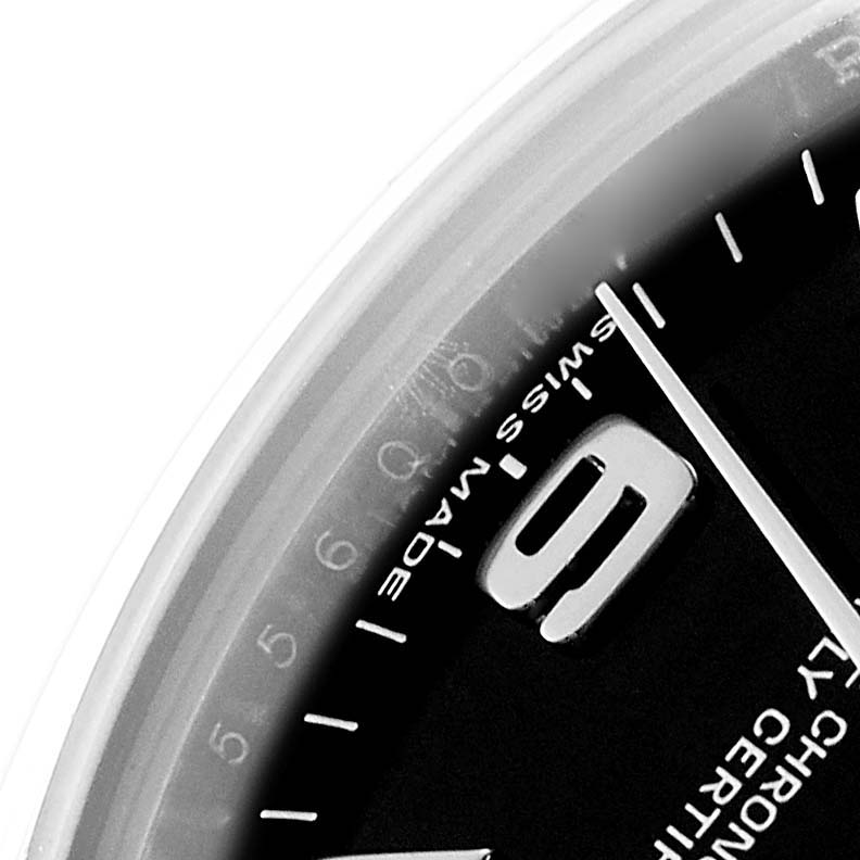 The image shows a close-up of the dial and markers at the 9 o'clock position of a mid-size Rolex watch.