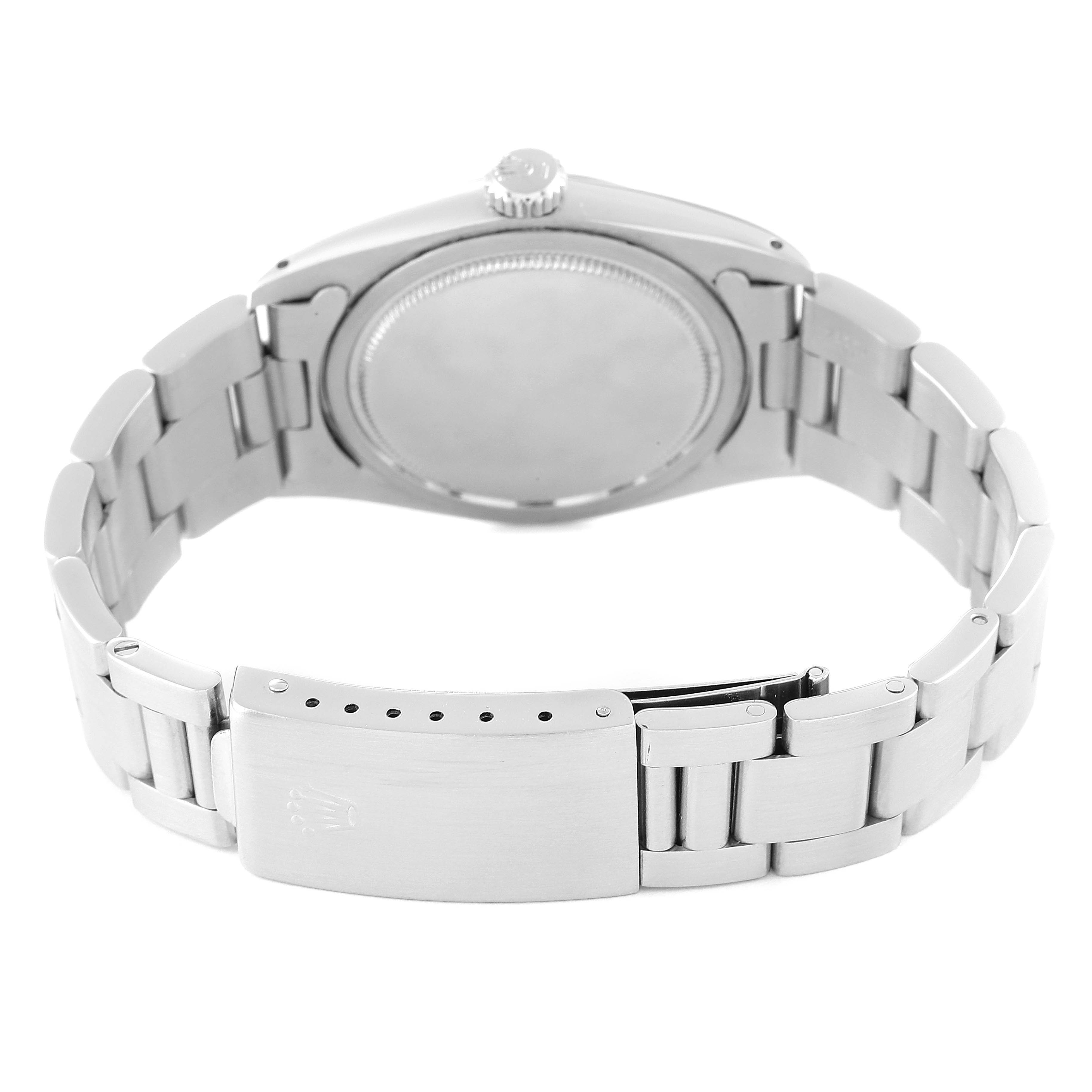 The image shows the back view of the Rolex Vintage Collection 6426 Men
s Stainless Steel Silver Dial 6426 Men
s Stainless Steel Silver Dial watch, highlighting its case back and bracelet.