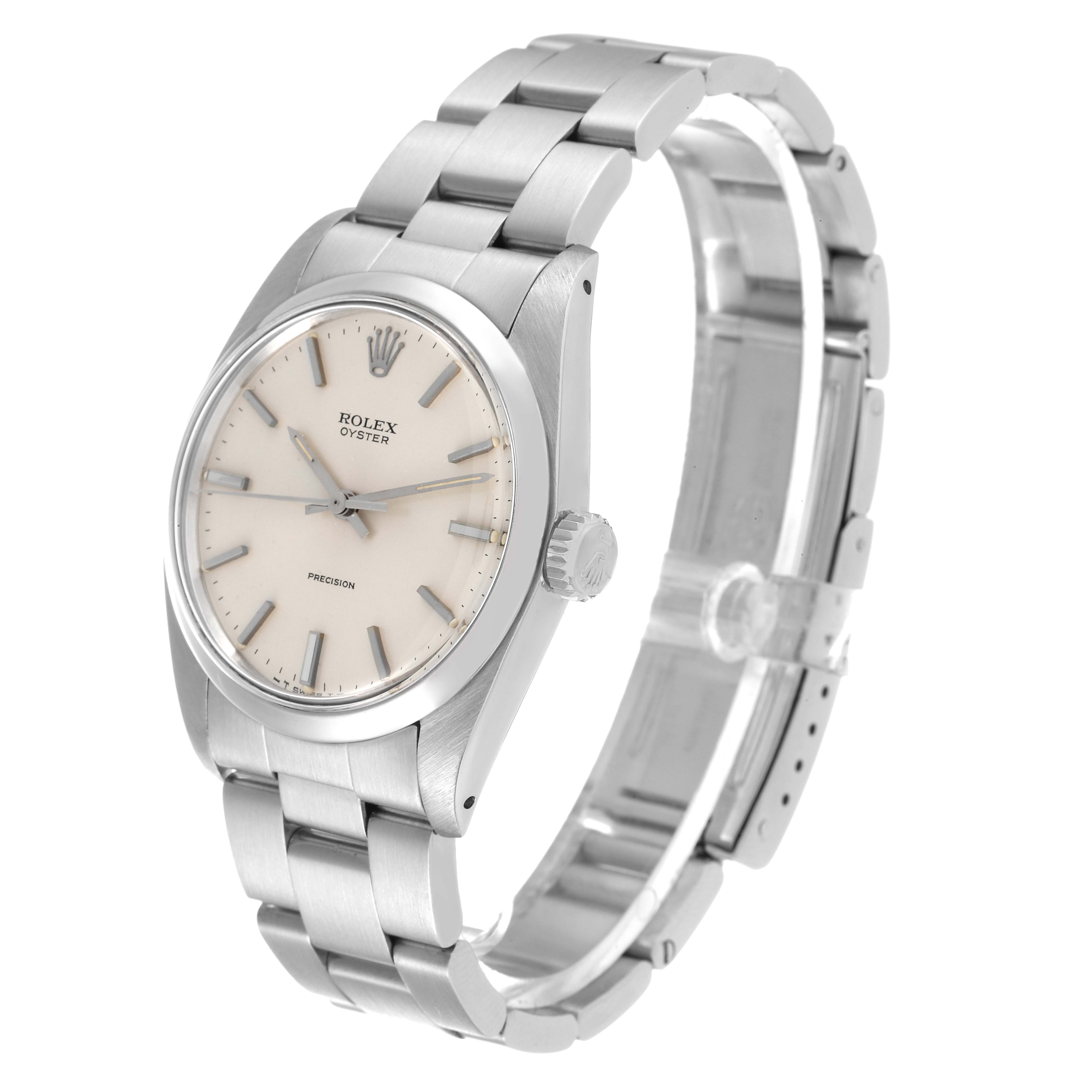 The image shows a side angle of the Rolex Vintage Collection 6426 Men
s Stainless Steel Silver Dial 6426 Men
s Stainless Steel Silver Dial model, highlighting the watch face, crown, and metal bracelet.