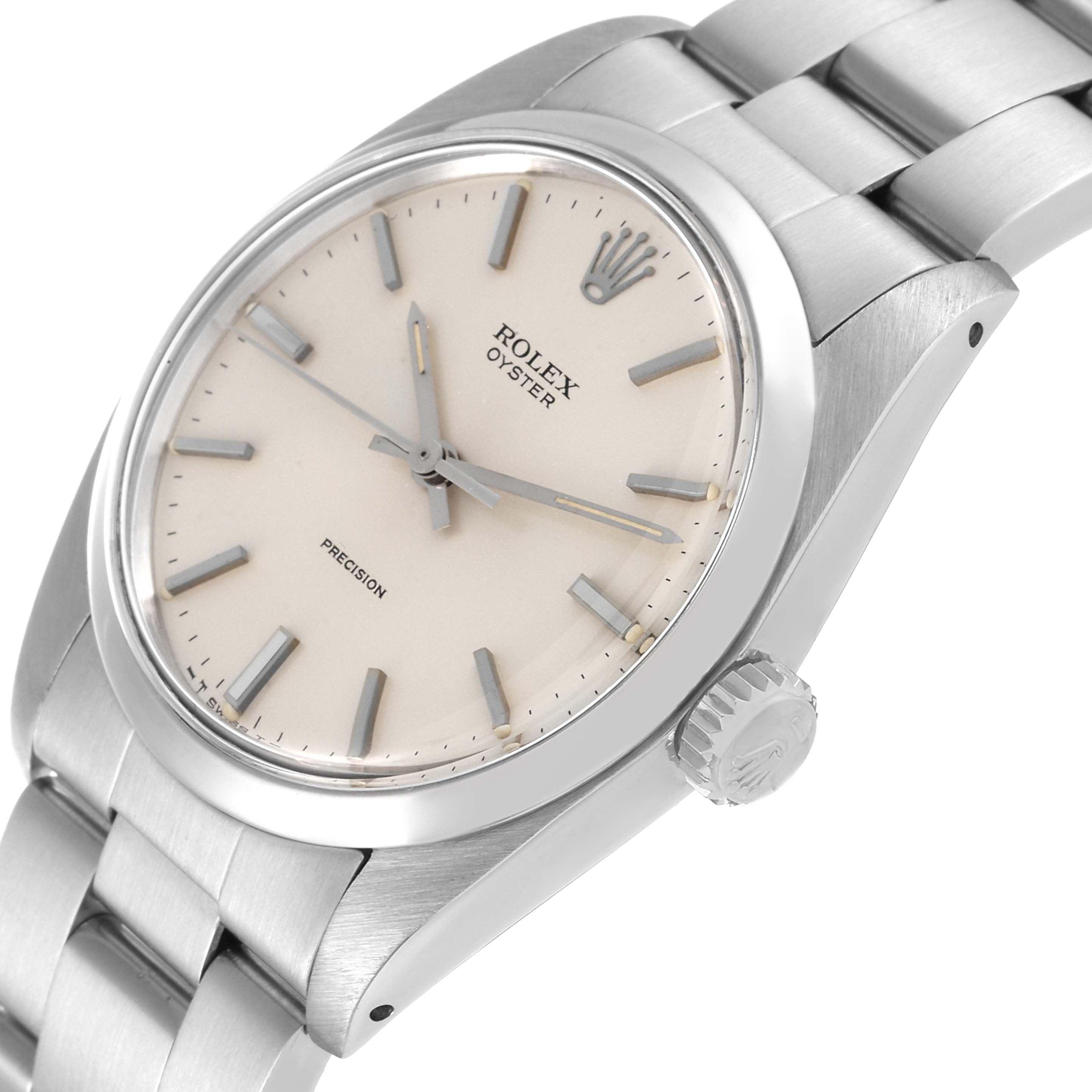 The image shows a close-up, angled view of the face, bezel, crown, and part of the bracelet of a Rolex Vintage Collection 6426 Men
s Stainless Steel Silver Dial 6426 Men
s Stainless Steel Silver Dial watch.