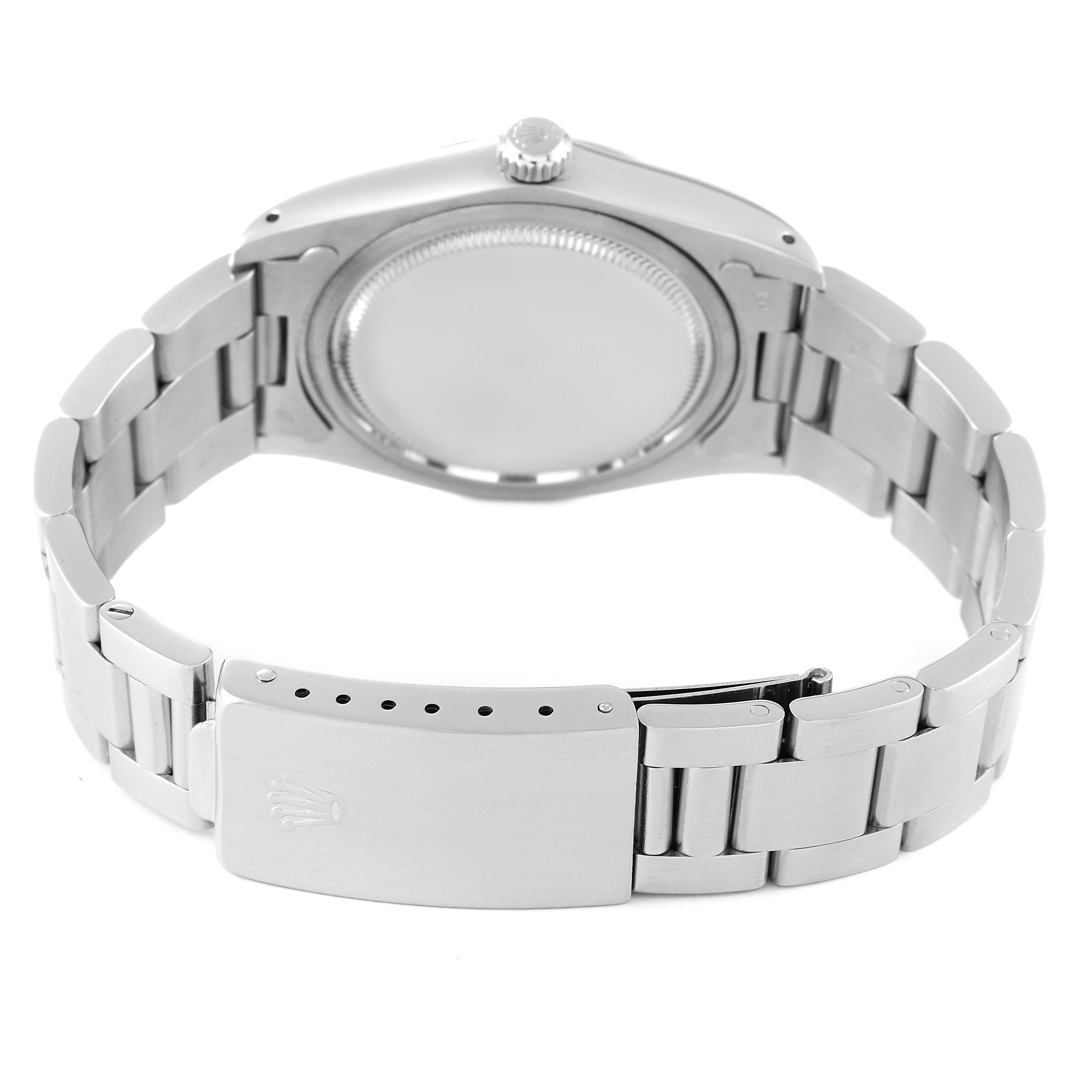 The image shows the back and clasp of a Rolex Vintage Collection 6694 Men
s Stainless Steel Silver Dial 6694 Men
s Stainless Steel Silver Dial model, displaying the case back and bracelet.