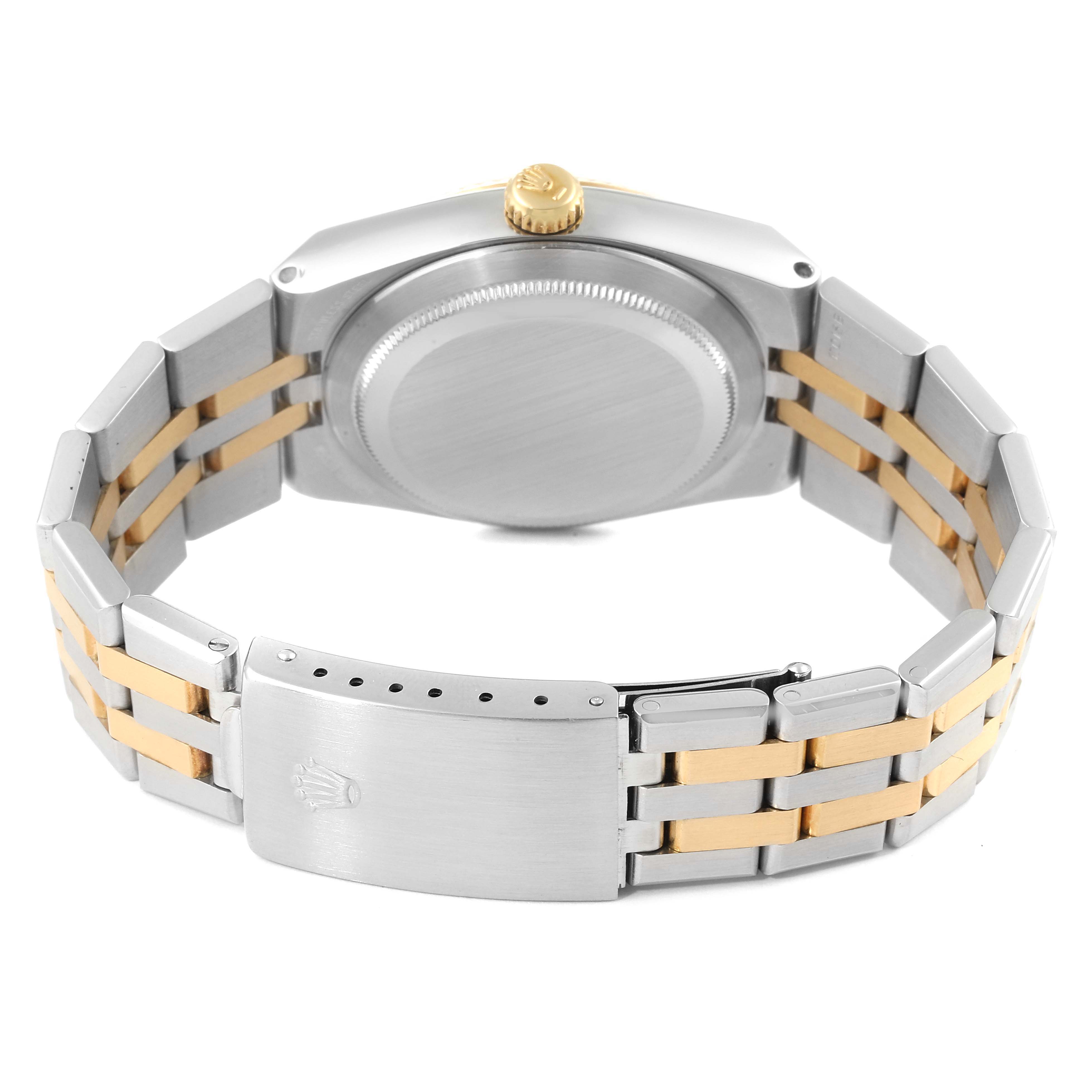 The image shows the back view of a Rolex Oysterquartz 17013 Men's Steel and Gold (two tone) Champagne Dial 17013 Men's Steel and Gold (two tone) Champagne Dial watch, highlighting its two-tone bracelet, clasp, and caseback.