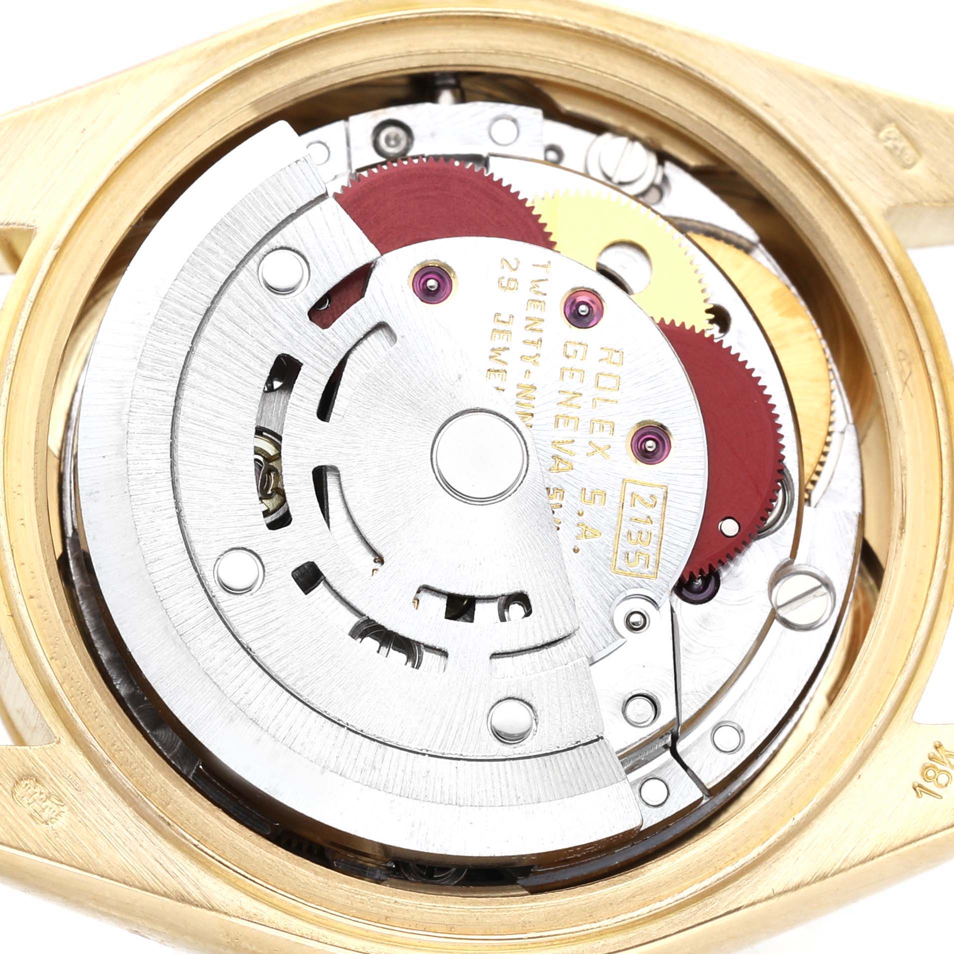 The image shows the movement of a Rolex President 69178 Women's Yellow Gold Grey Dial watch from a top view, highlighting its intricate internal components.