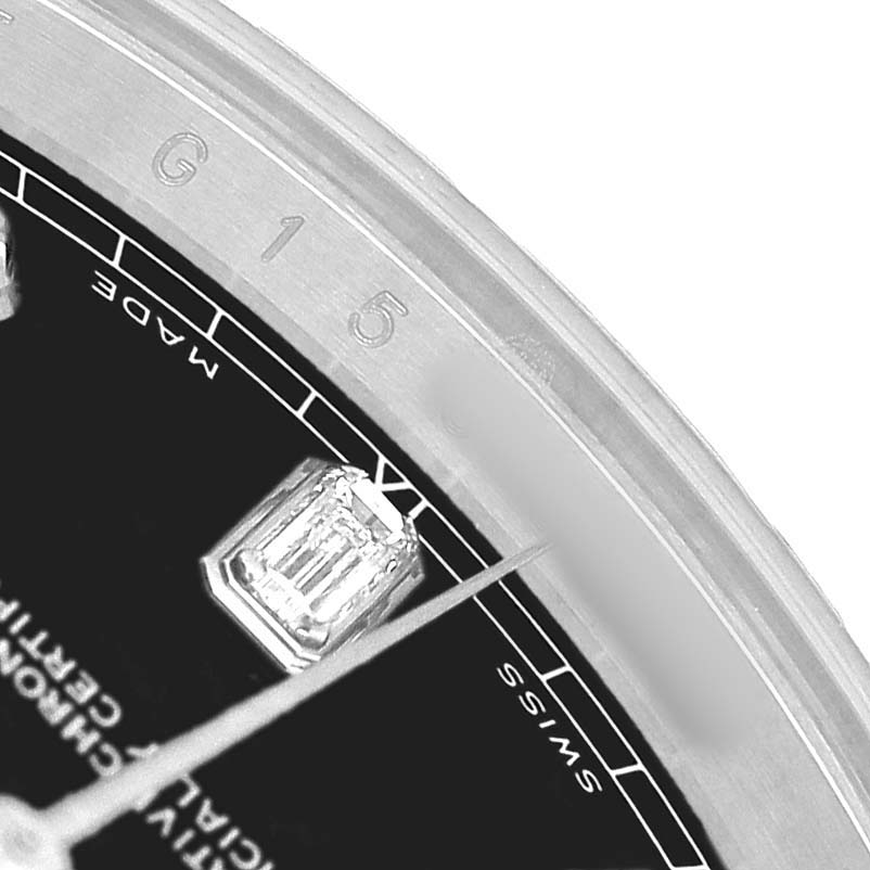 The image shows a close-up of the dial and bezel of a Rolex President 218239 Men's White Gold Black Dial watch, highlighting the markers and text.