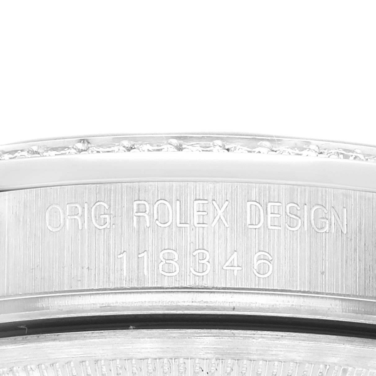 The image shows a close-up of the side of the bezel and casing on a Rolex President 118346 Men's Platinum Blue Dial 118346 Men's Platinum Blue Dial model watch.
