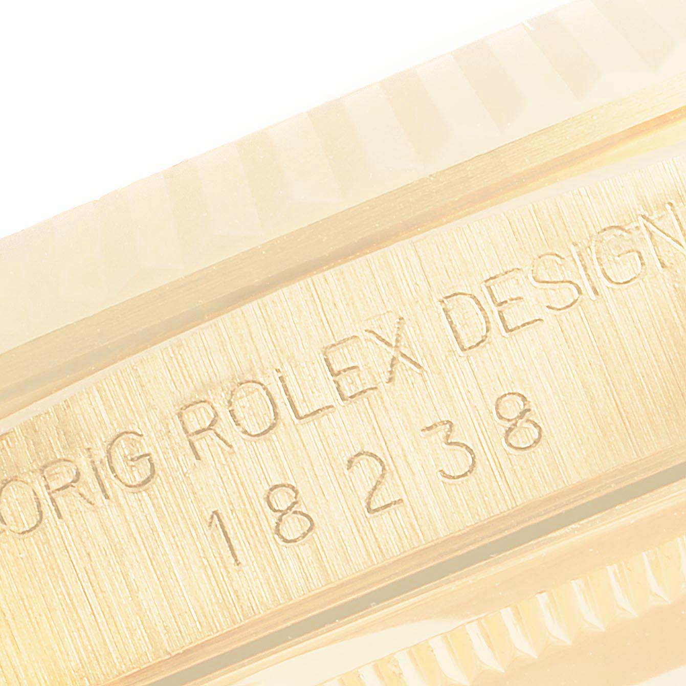 This close-up image shows the engraved model number and design text on the side edge of the Rolex President 18238 Men's Yellow Gold Champagne Dial 18238 Men's Yellow Gold Champagne Dial watch.