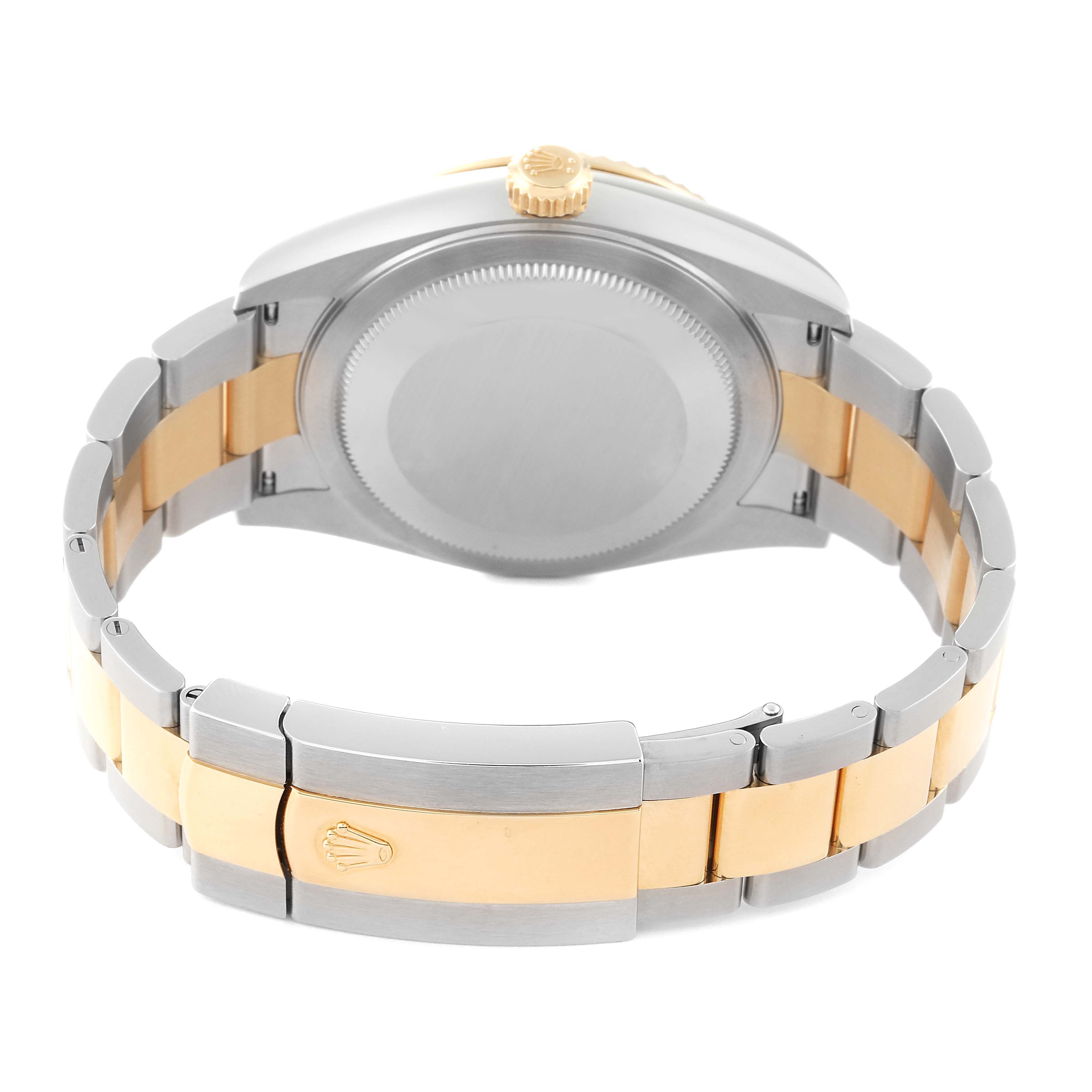 This image shows a rear view of a Rolex Sky-Dweller 326933 Men
s Steel and Gold (two tone) Black Dial 326933 Men
s Steel and Gold (two tone) Black Dial watch, highlighting its case back, bracelet, and clasp.