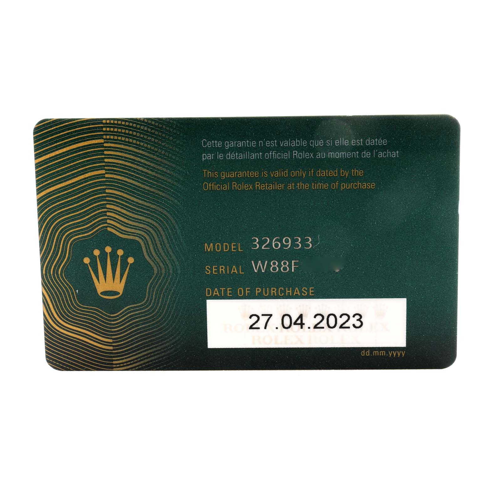 This image shows a warranty card for a Rolex Sky-Dweller 326933 Men
s Steel and Gold (two tone) Black Dial 326933 Men
s Steel and Gold (two tone) Black Dial model, displaying the model number, serial number, and date of purchase.