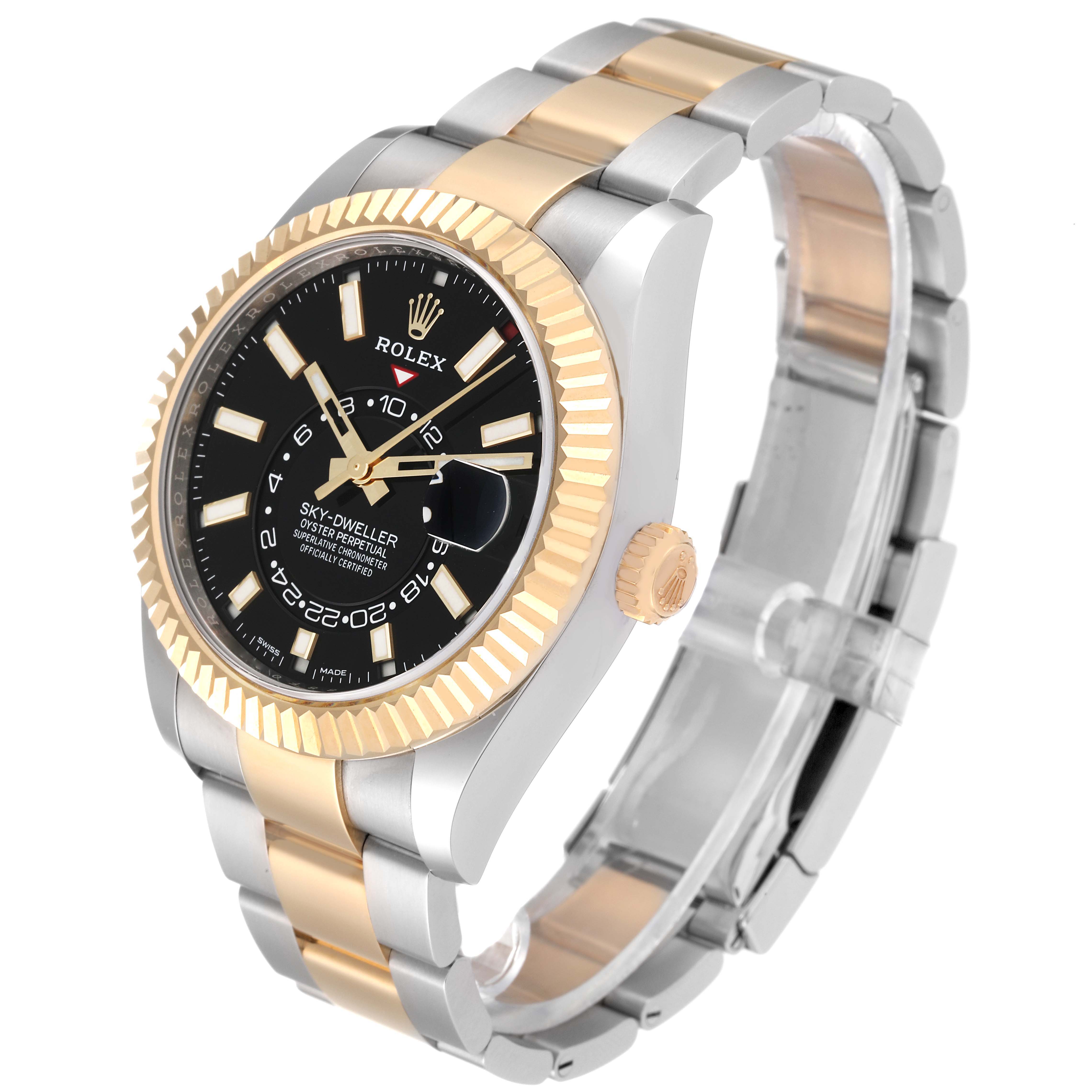 The image shows an angled view of a Rolex Sky-Dweller 326933 Men
s Steel and Gold (two tone) Black Dial 326933 Men
s Steel and Gold (two tone) Black Dial watch, highlighting its face, bezel, and bracelet.