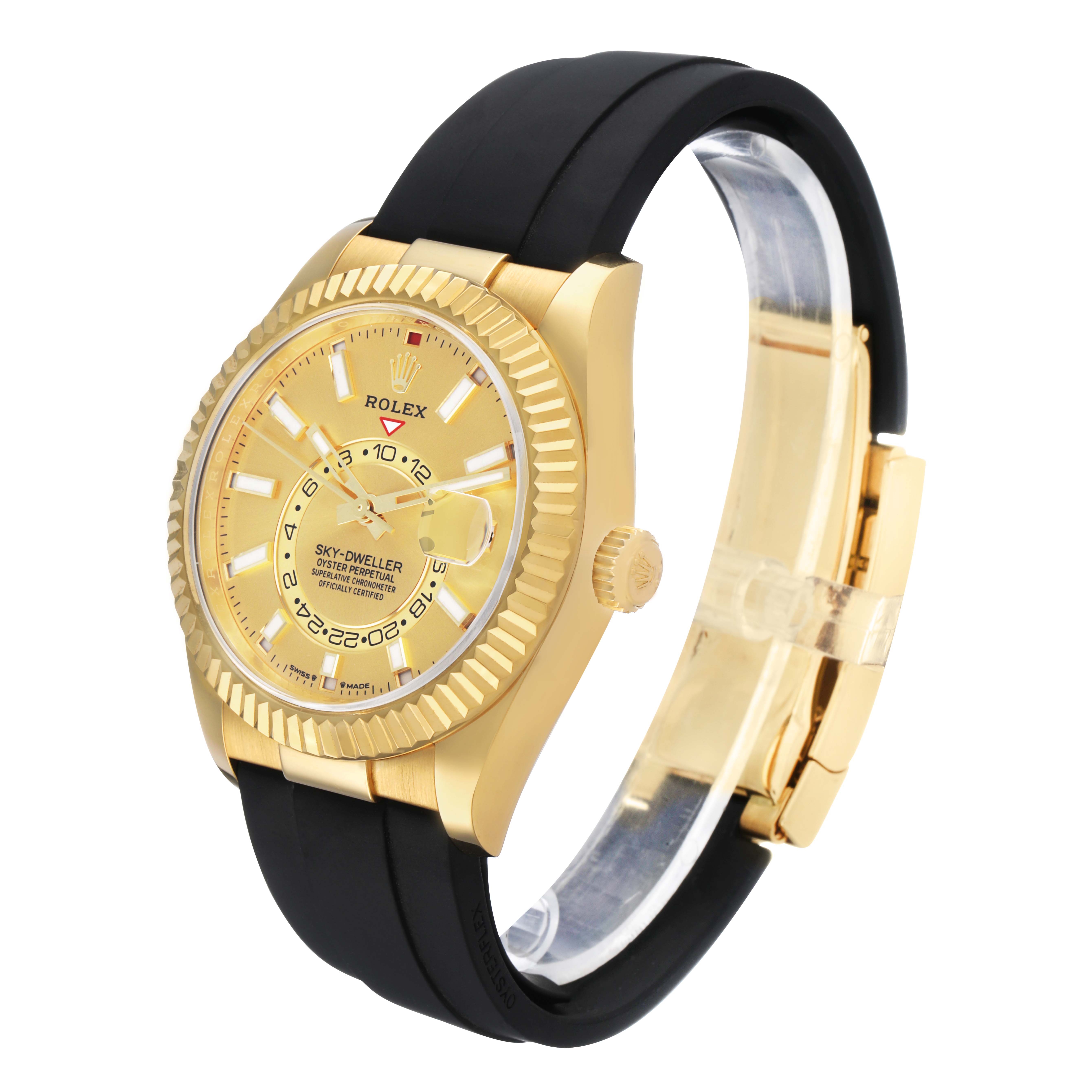 This image shows a Rolex Sky-Dweller 336238 Men's Yellow Gold Champagne Dial from an angled side view, highlighting its gold case, bezel, and black strap.