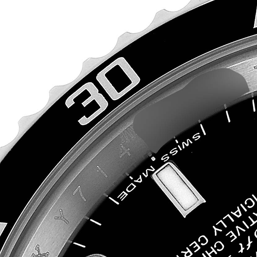 This close-up angle captures the bezel and a portion of the dial of the Rolex Submariner 14060M Men's Stainless Steel Black Dial 14060M Men's Stainless Steel Black Dial watch.