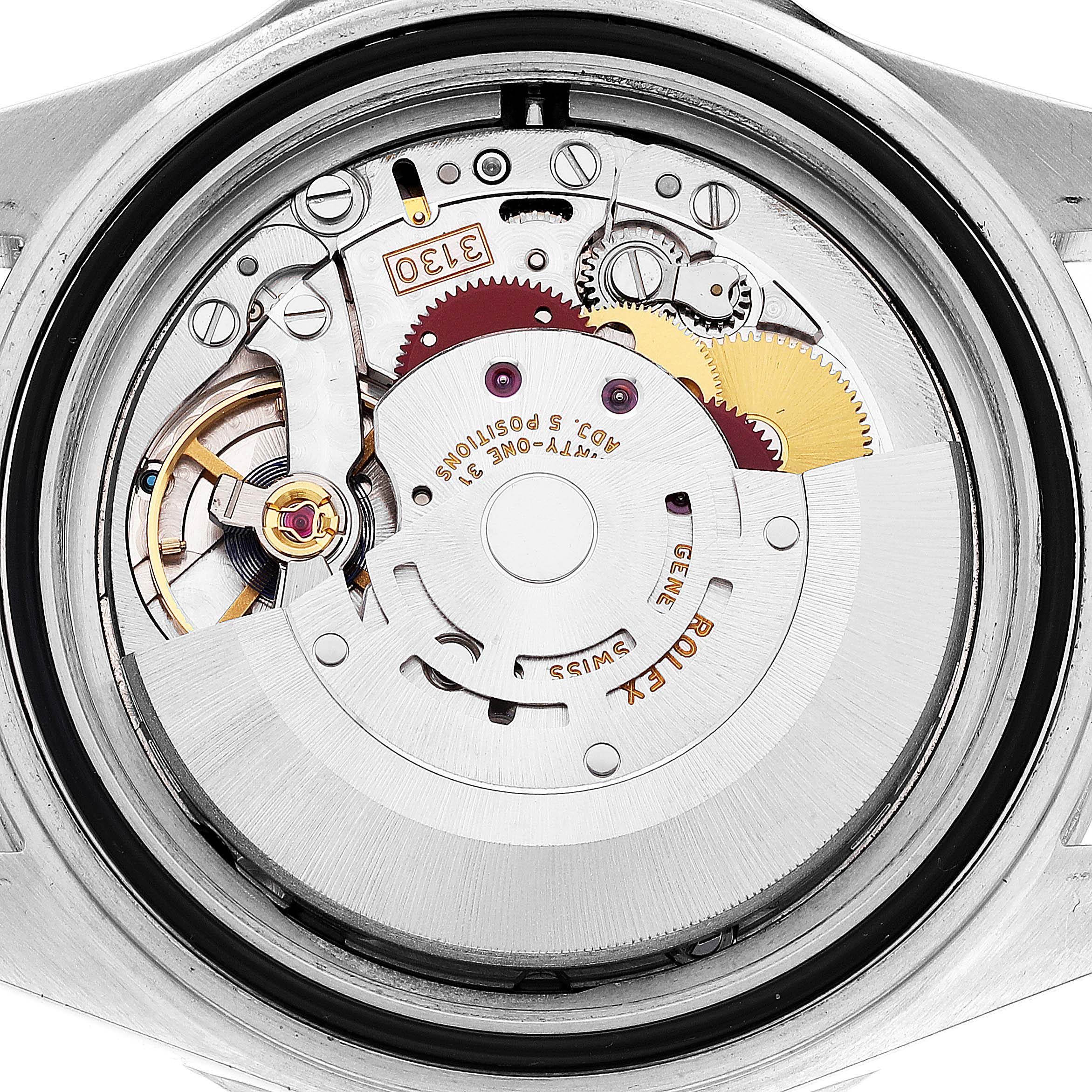 This image shows the inner mechanical movement components of a Rolex Submariner 14060M Men's Stainless Steel Black Dial 14060M Men's Stainless Steel Black Dial watch from a direct downward angle.