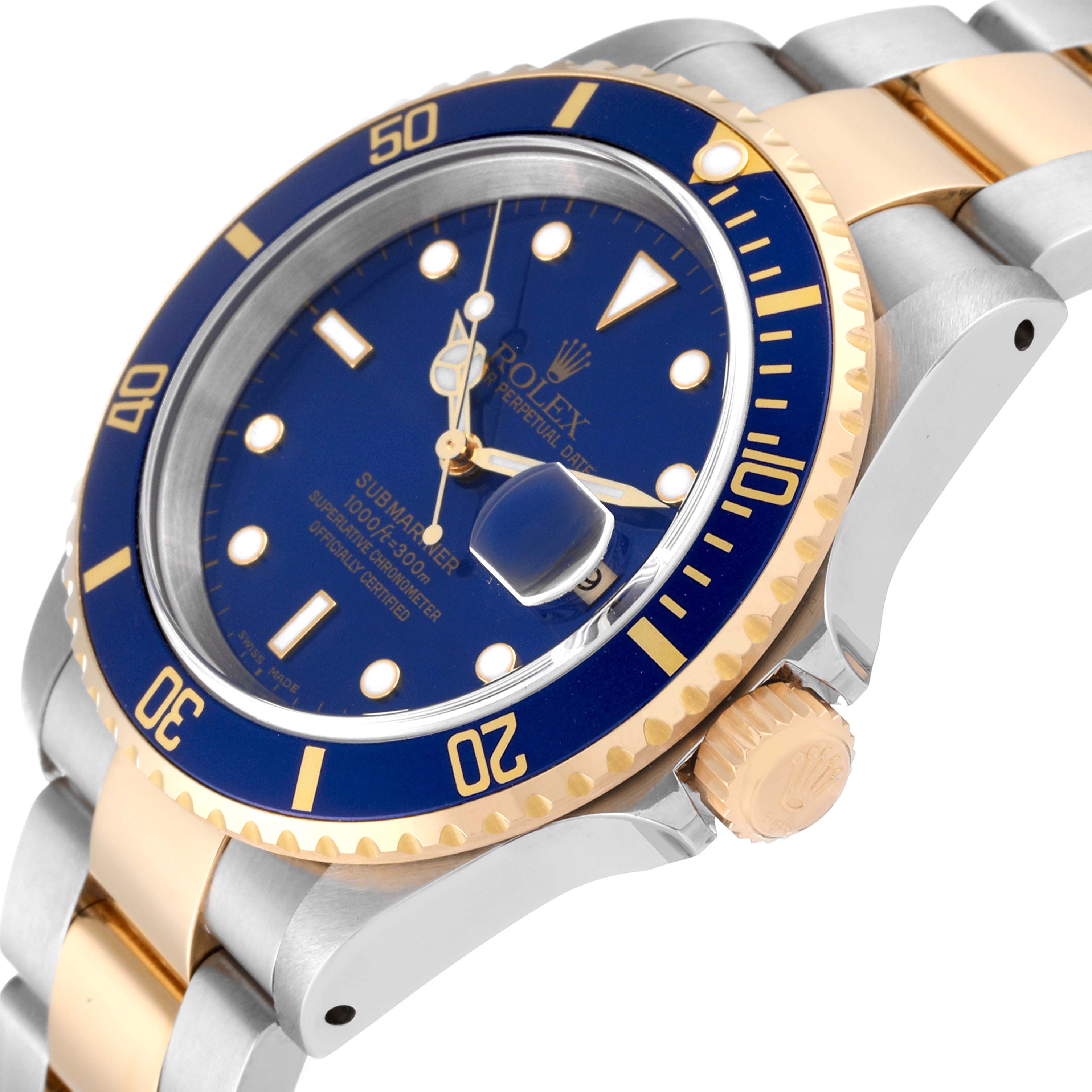 The image shows a close-up side view of a Rolex Submariner 16613LB Men
s Steel and Gold (two tone) Blue Dial 16613LB Men
s Steel and Gold (two tone) Blue Dial watch, highlighting the blue dial, bezel, and two-tone bracelet.