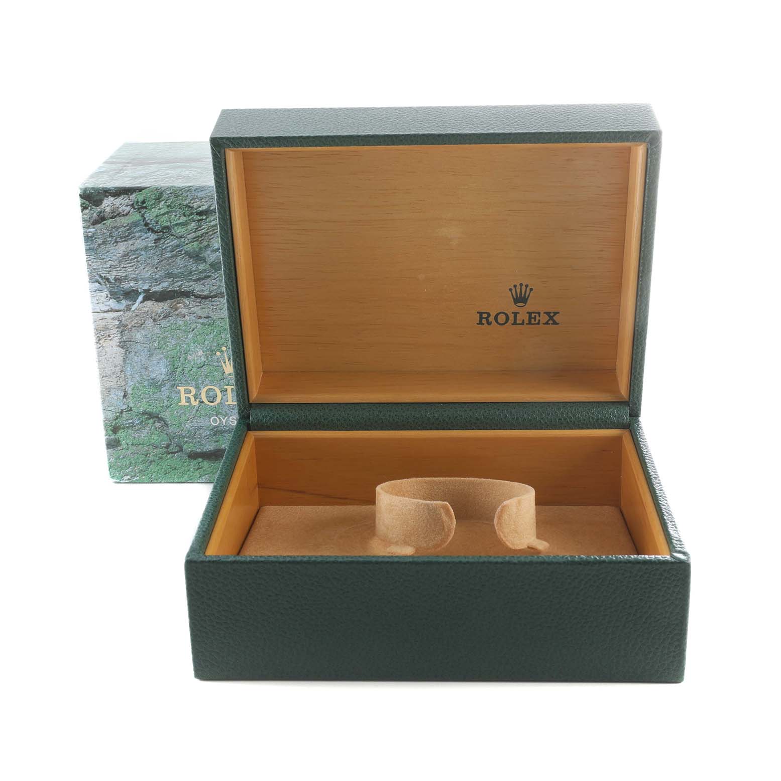 This image shows an empty Rolex Submariner 16613LB Men
s Steel and Gold (two tone) Blue Dial 16613LB Men
s Steel and Gold (two tone) Blue Dial watch box with its lid open and the watch cushion inside.