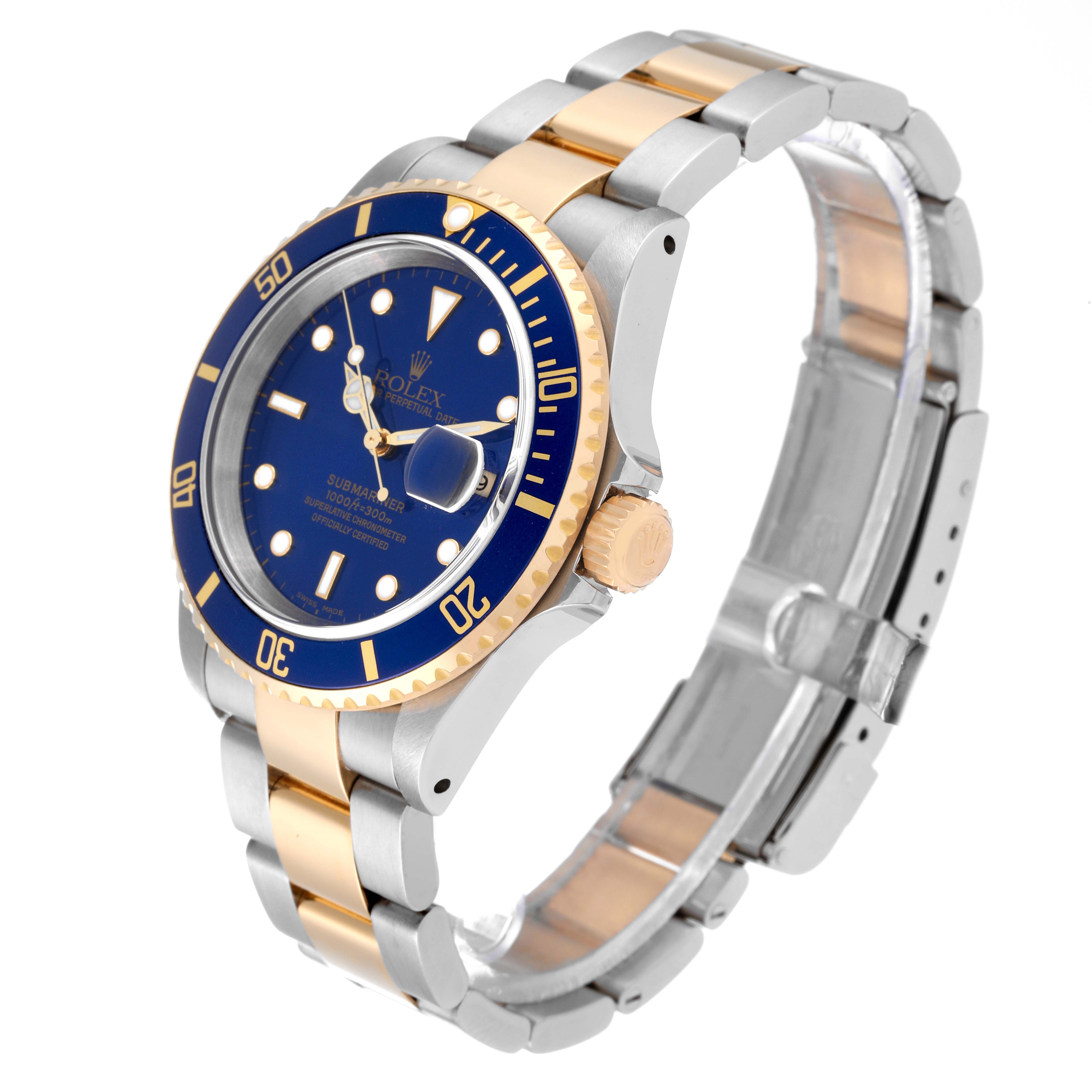 This image shows a Rolex Submariner 16613LB Men
s Steel and Gold (two tone) Blue Dial 16613LB Men
s Steel and Gold (two tone) Blue Dial watch at a 3/4 angle, highlighting its blue dial, gold bezel, and two-tone metal bracelet.