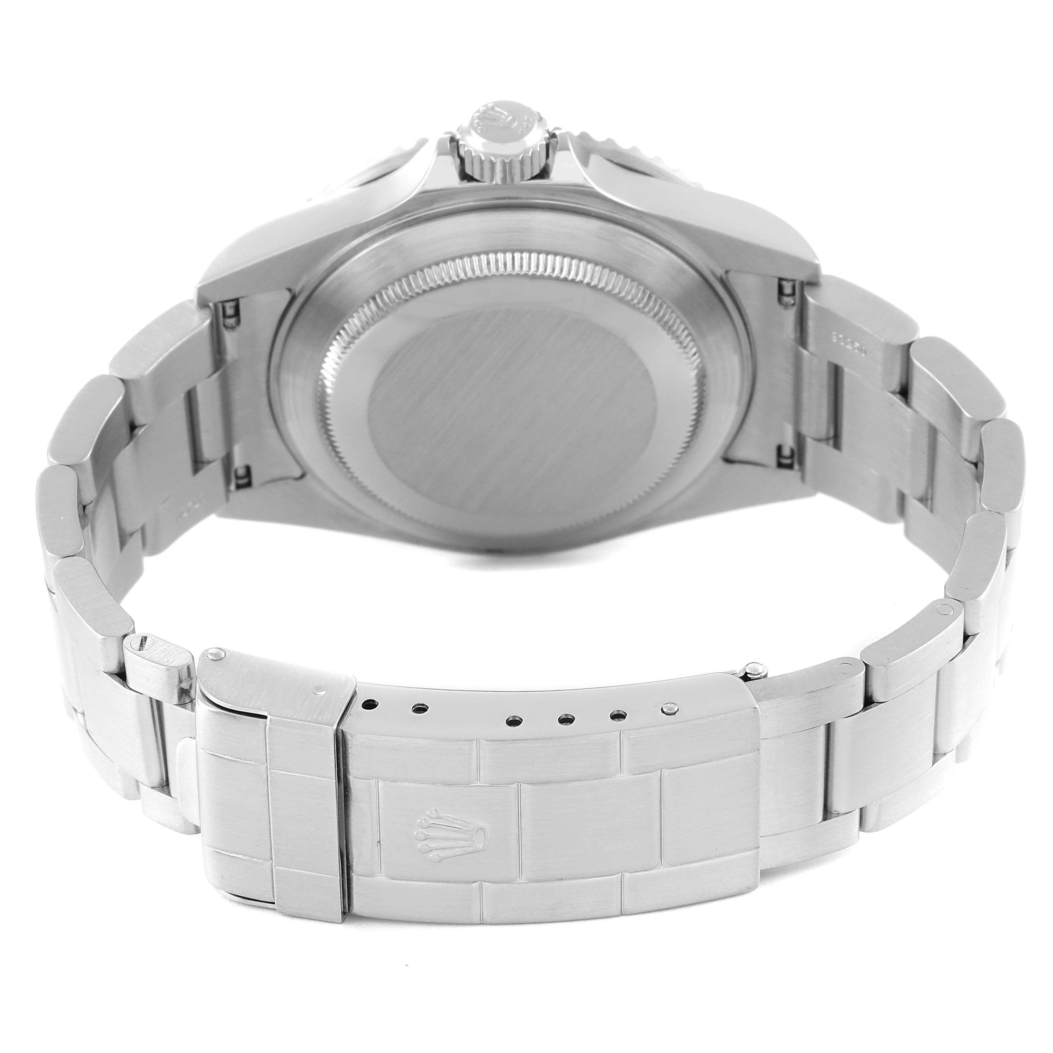 The image shows the back side and bracelet of a Rolex Submariner 16610T Men
s Stainless Steel Black Dial 16610T Men
s Stainless Steel Black Dial watch, highlighting the clasp and case back.