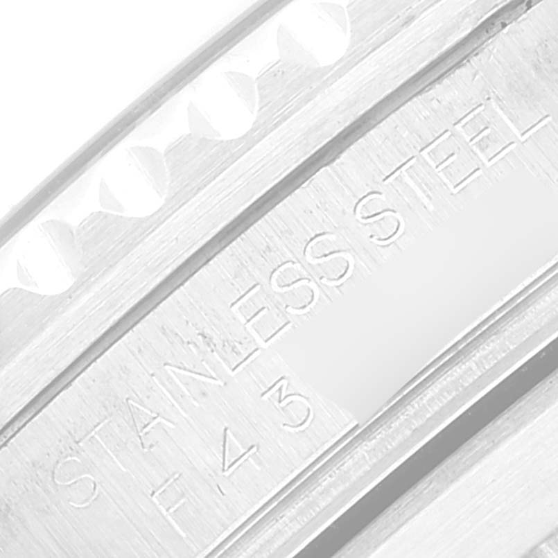 The image shows a close-up of the stainless steel bracelet clasp of a Rolex Submariner 16610T Men
s Stainless Steel Black Dial 16610T Men
s Stainless Steel Black Dial watch.