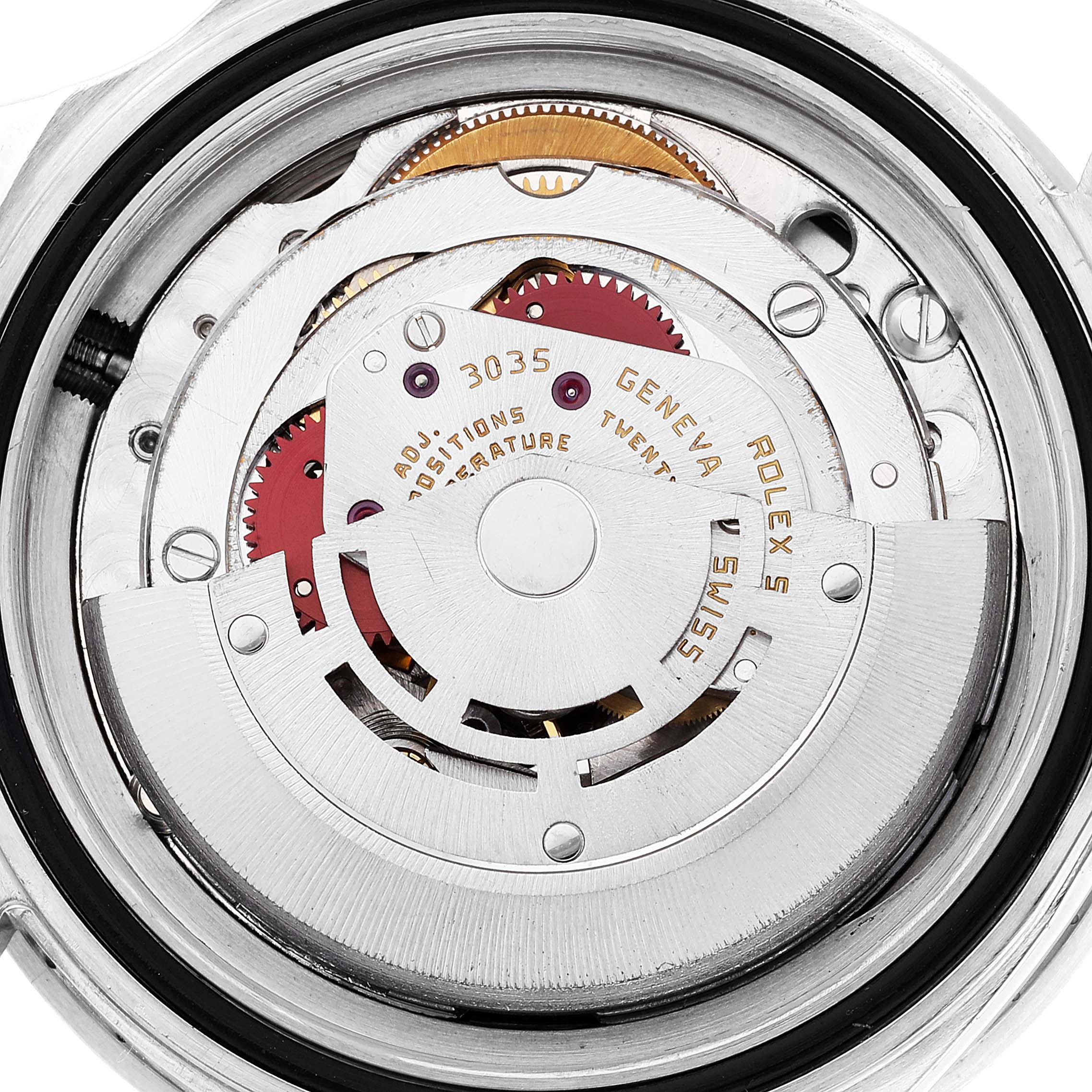 The image shows a close-up of the movement mechanism of a Rolex Vintage Collection 16800 Men's Stainless Steel Black Dial 16800 Men's Stainless Steel Black Dial watch, model 3035, showcasing its intricate components.