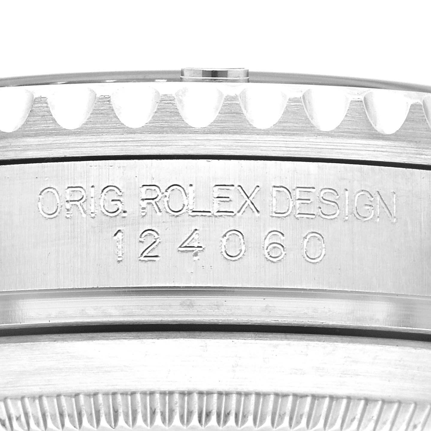 This close-up shot shows the engraved case side of a Rolex Submariner 124060 Men
s Stainless Steel Black Dial 124060 Men
s Stainless Steel Black Dial with the model number 124060.