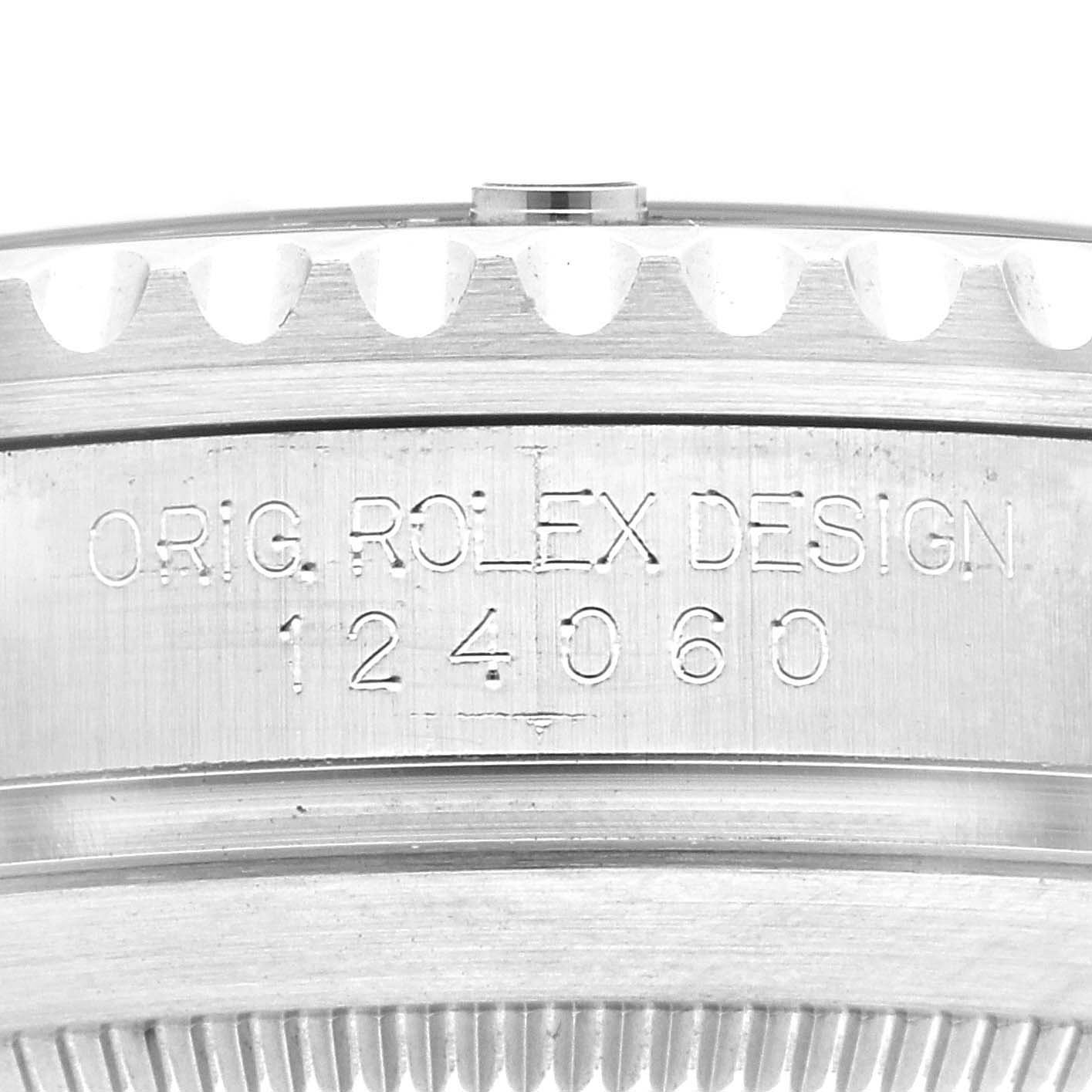This image shows a close-up view of the case side engraving on a Rolex Submariner 124060 Men
s Stainless Steel Black Dial 124060 Men
s Stainless Steel Black Dial watch, displaying the model number 124060.