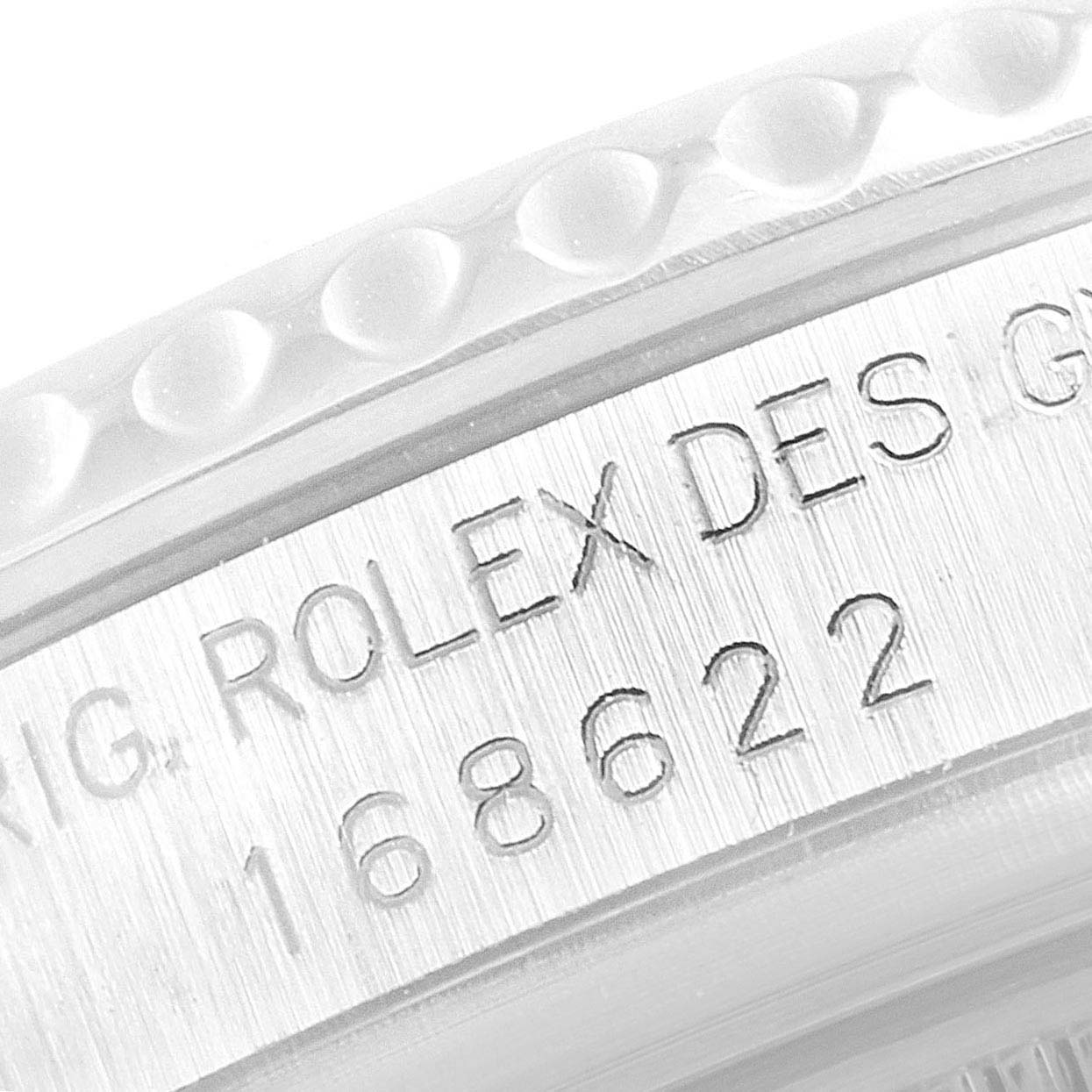 The image shows a close-up of the bezel and engraved edge of a Rolex Yacht-Master 168622 Men's Stainless Steel Silver Dial 168622 Men's Stainless Steel Silver Dial watch.
