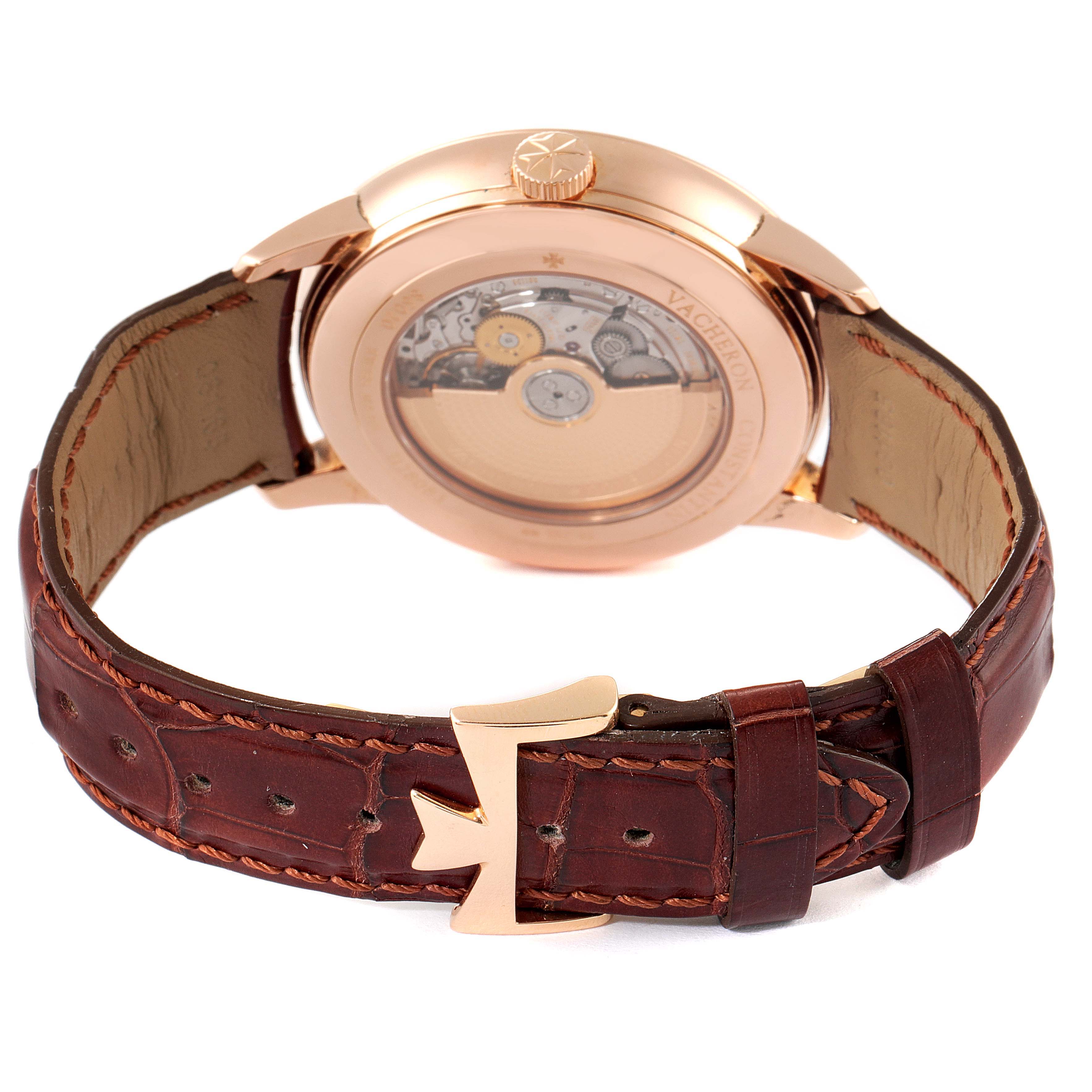 The image shows the back view of a Vacheron Constantin Patrimony 86020/000R-9239 Men's Rose Gold Silver Dial 86020/000R-9239 Men's Rose Gold Silver Dial watch, highlighting its case back, crown, and leather strap with a buckle.